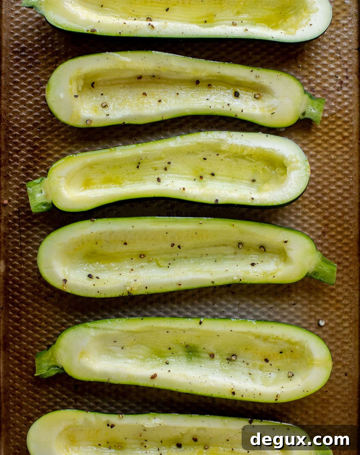 sliced zucchini with salt and pepper