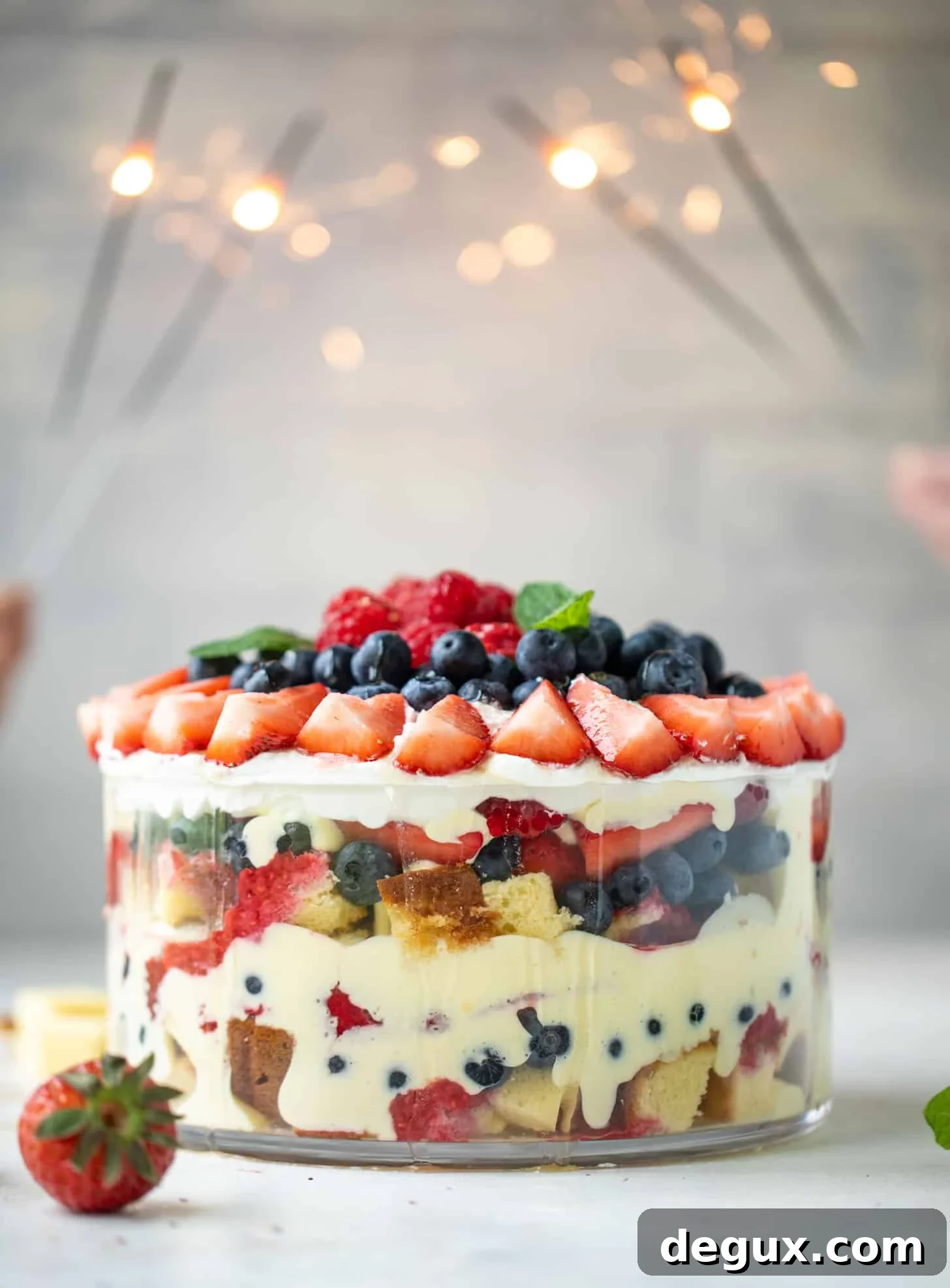 red white and blue berry trifle with raspberry sauce