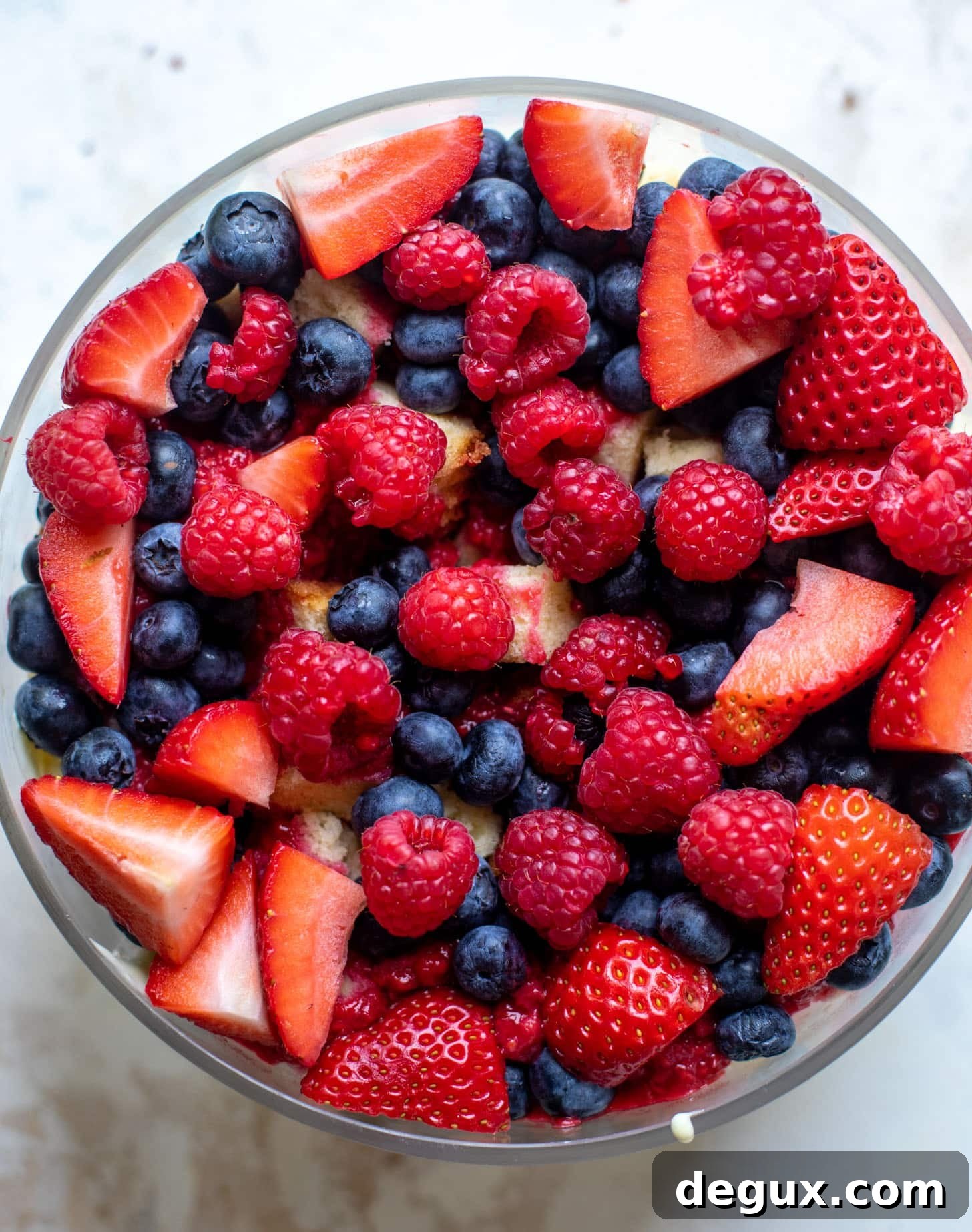 red white and blue berry trifle with raspberry sauce