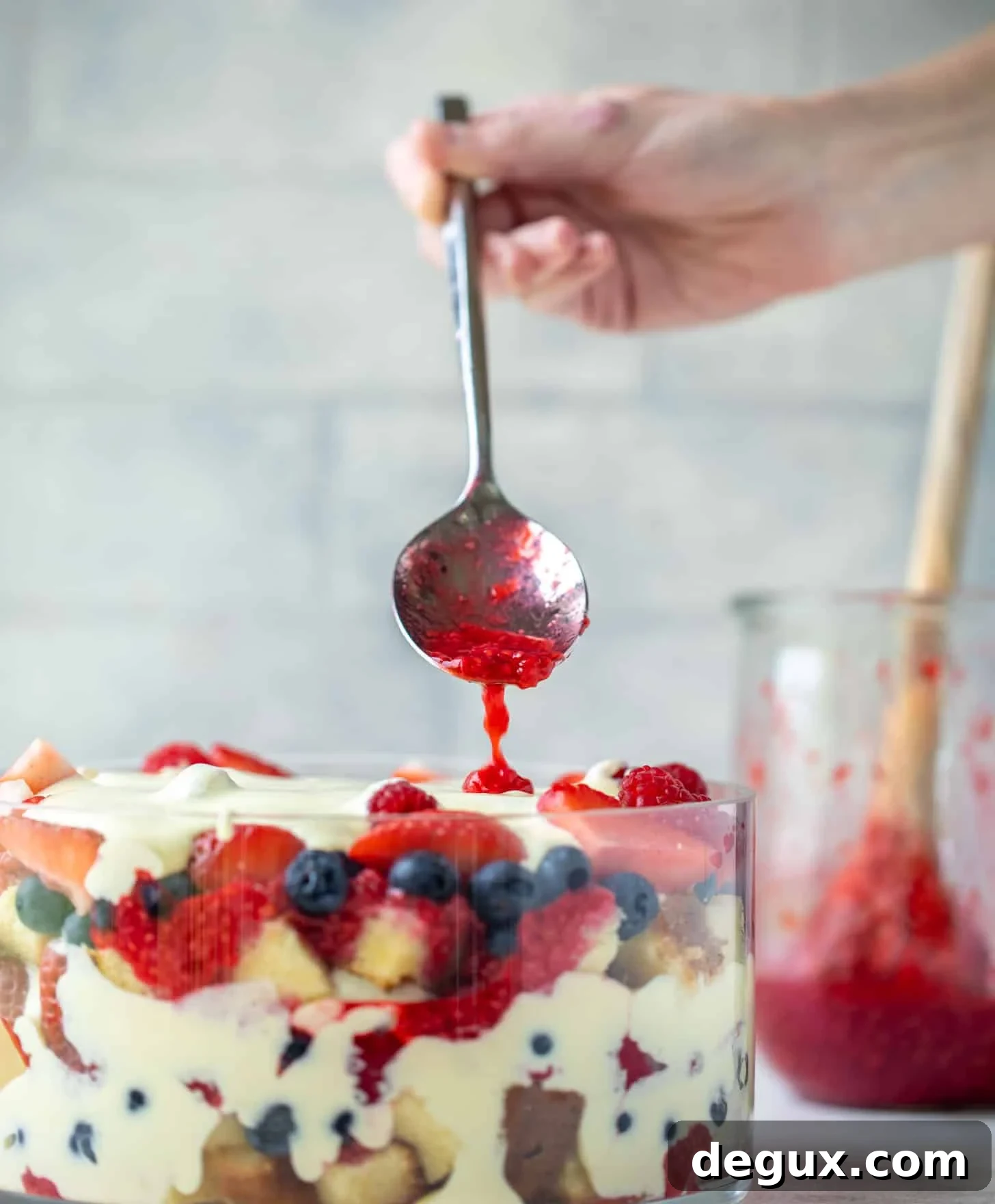 drizzle raspberry sauce on trifle