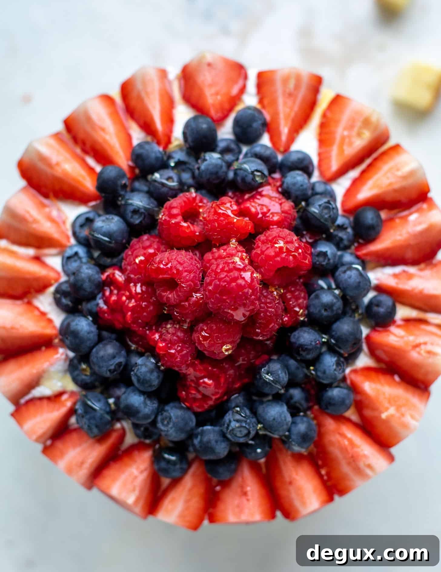 triple berry trifle with raspberry sauce