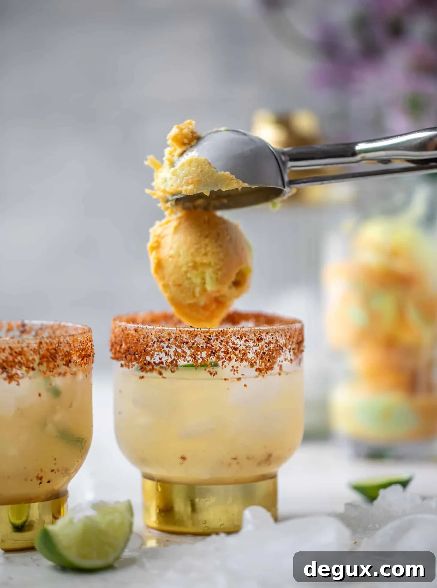 Refreshing Margarita Float Recipes: Boozy Frozen Cocktails to Try 5 dropping sherbet into a margarita