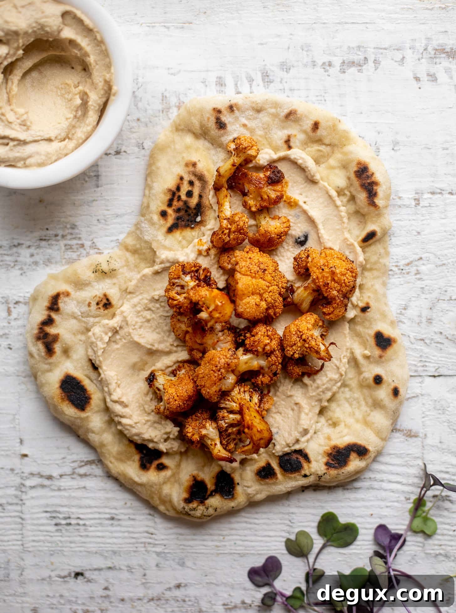 pita with hummus and cauliflower