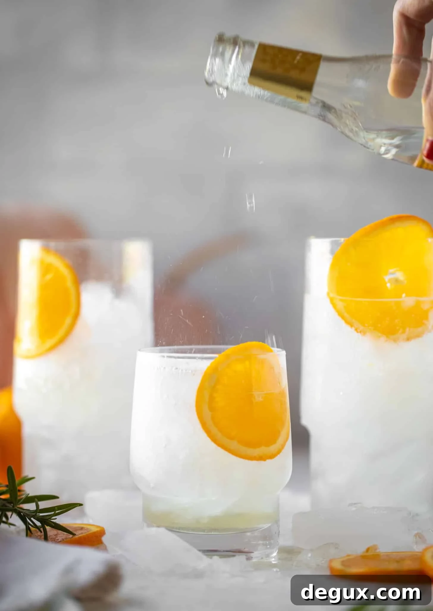 pouring tonic water in
