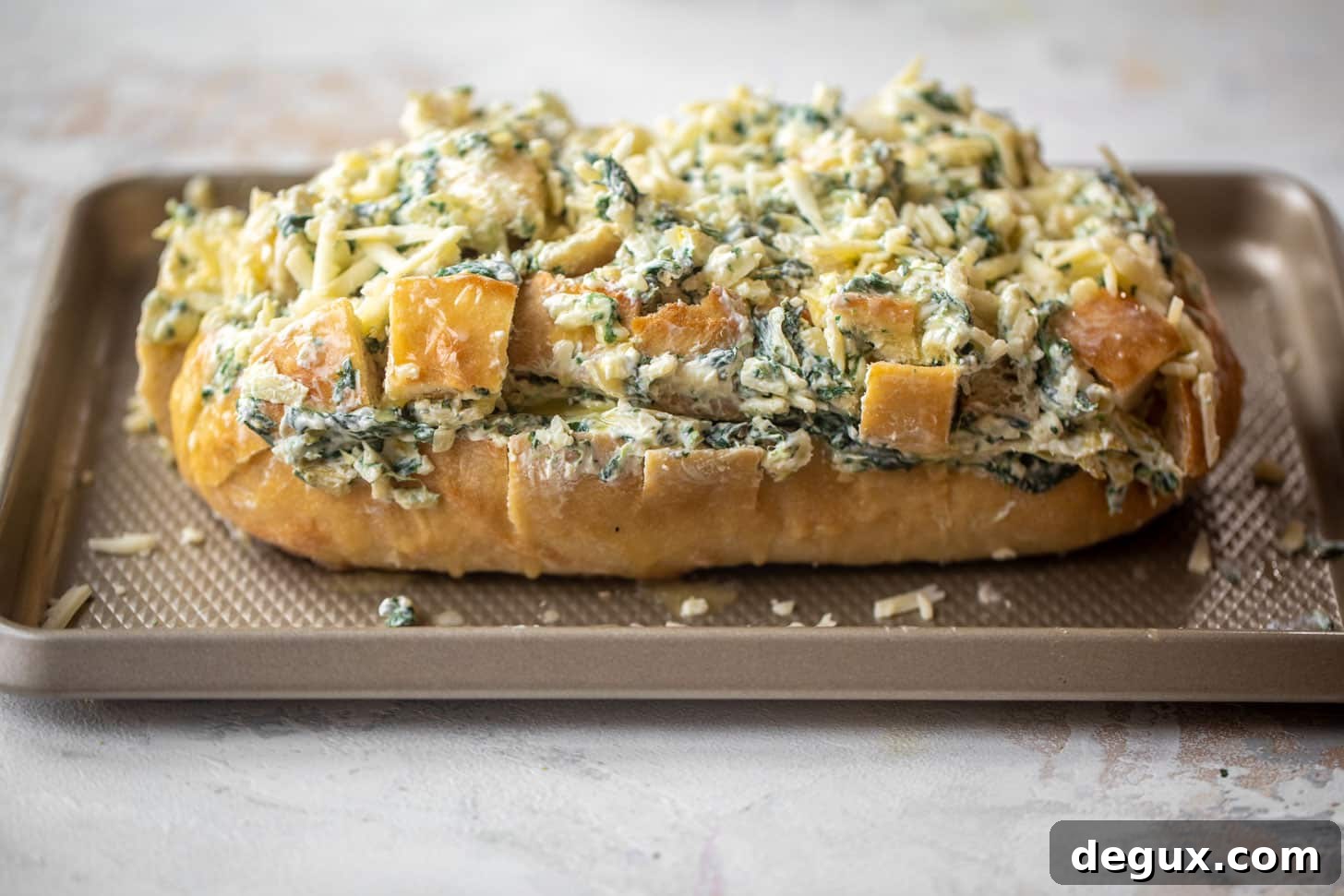 spinach artichoke pull apart bread ready for the oven