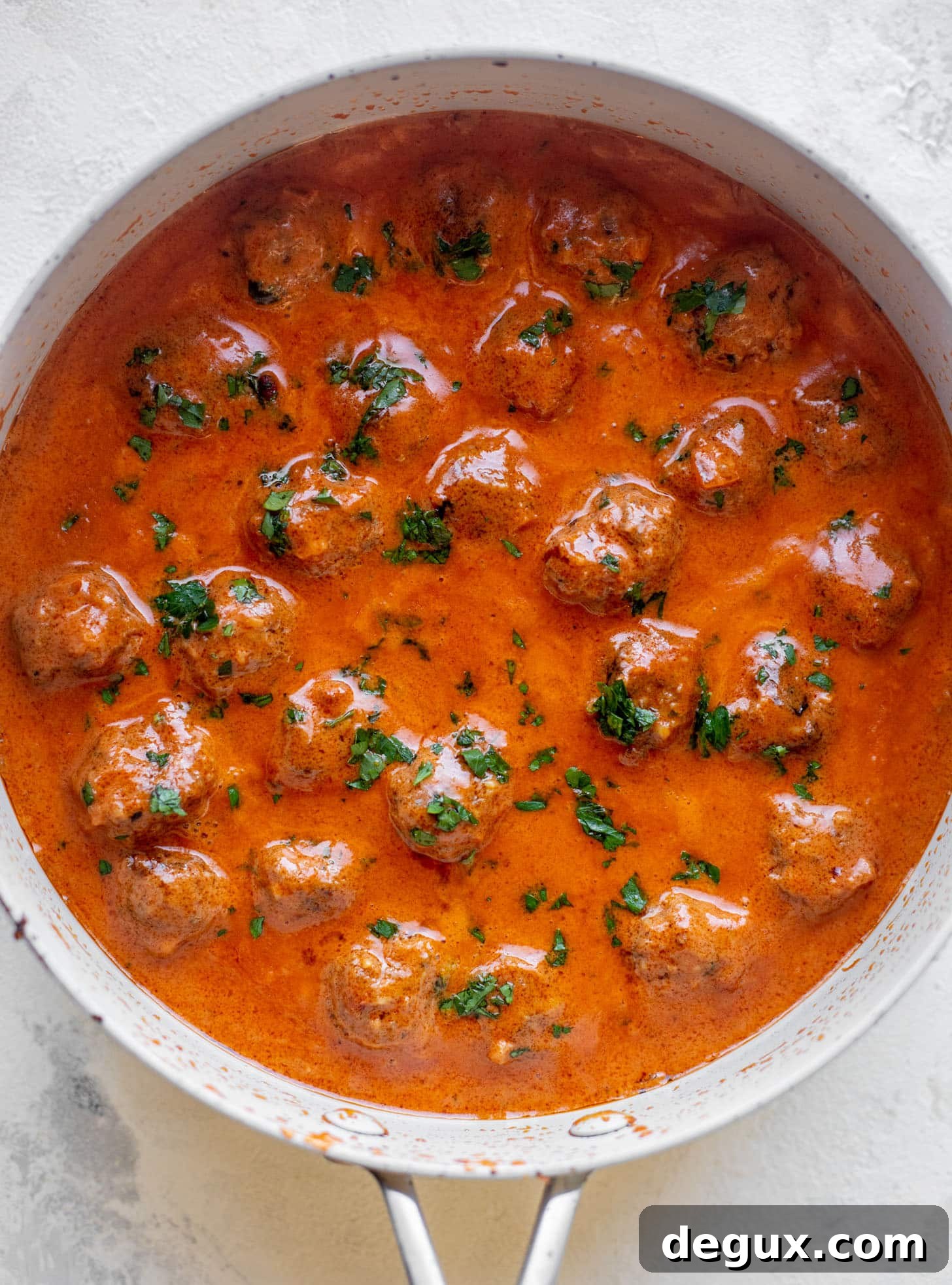 vodka sauce meatballs in skillet