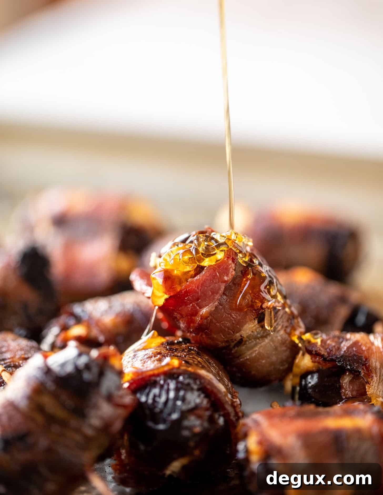hot honey bacon wrapped goat cheese stuffed dates