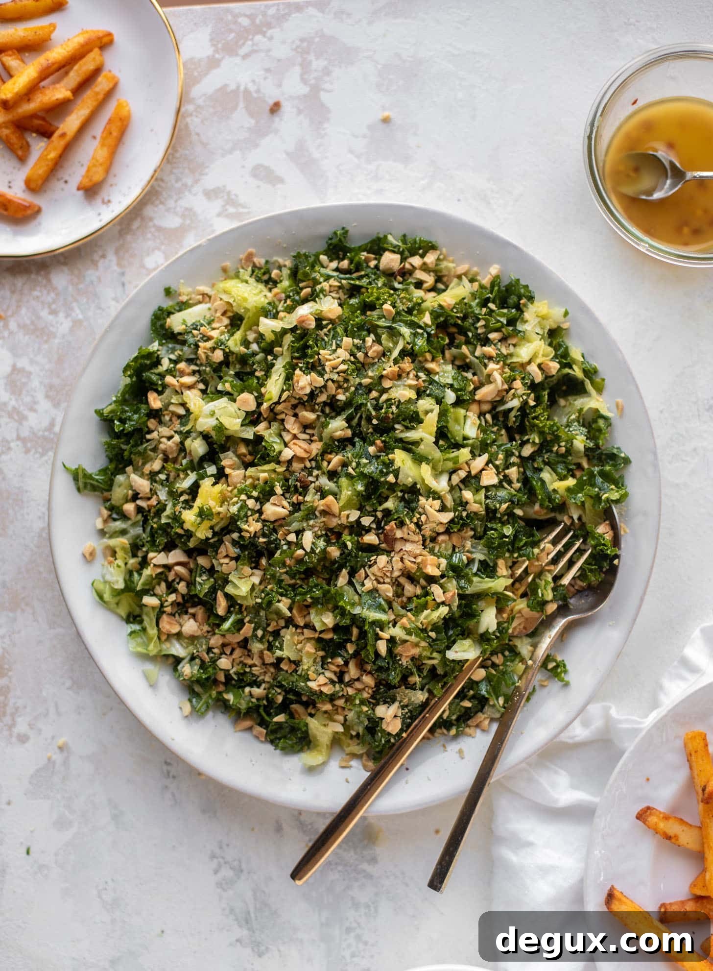 crunchy emerald kale salad with peanut vinaigrette