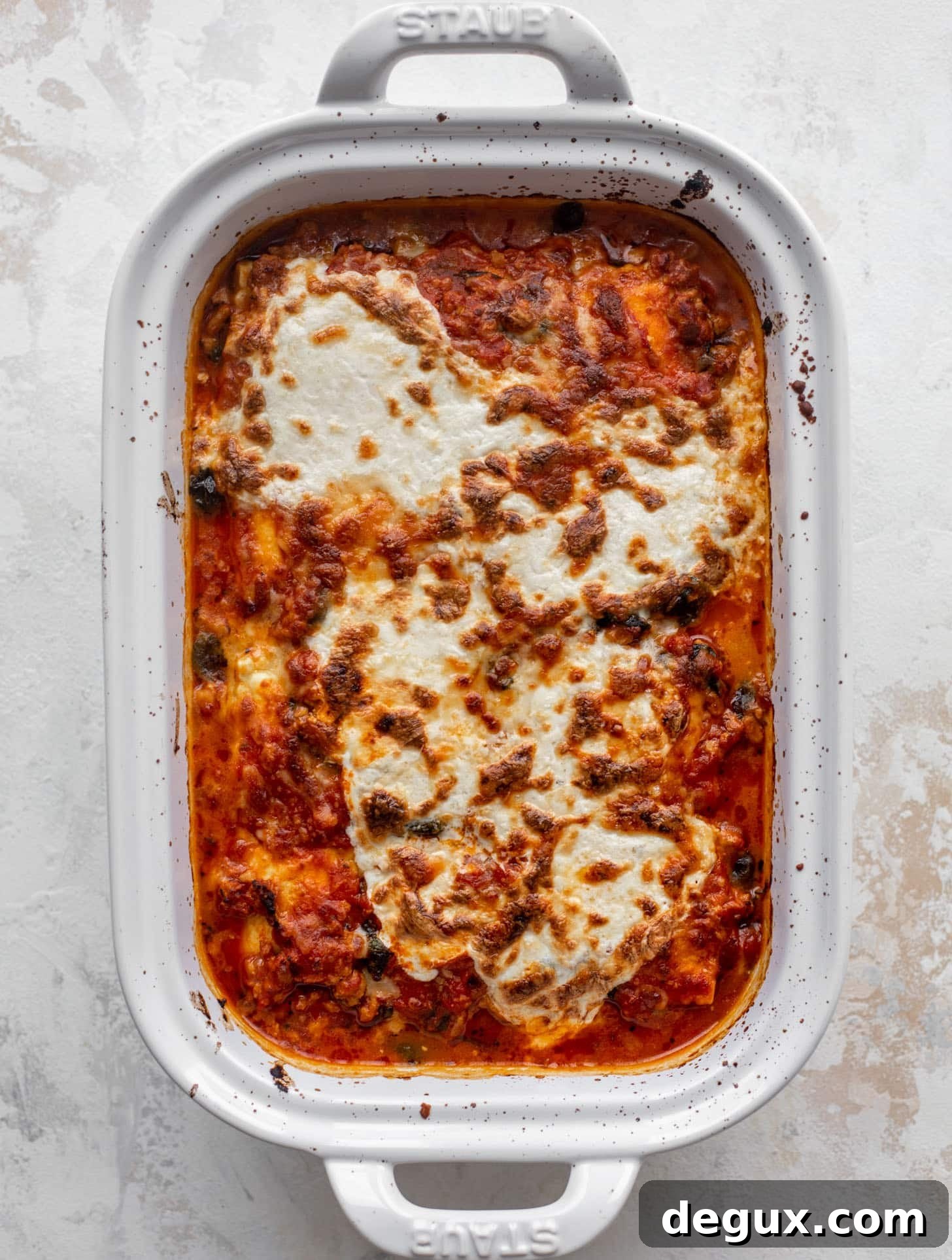 baked ravioli with spinach out of the oven