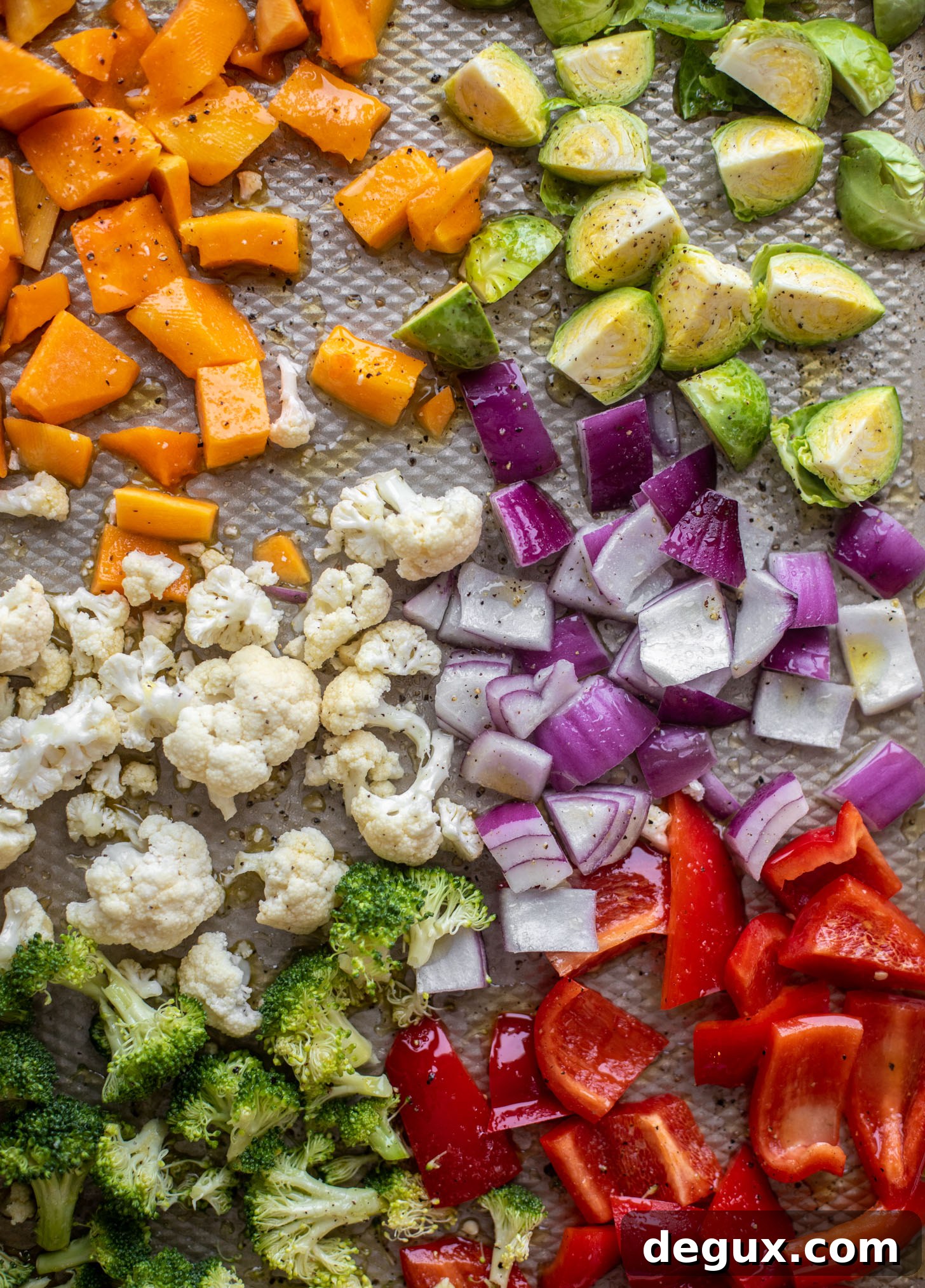 Winter Vegetable and Goat Cheese Galette Recipe for Cozy Nights 3 raw vegetables on baking sheet