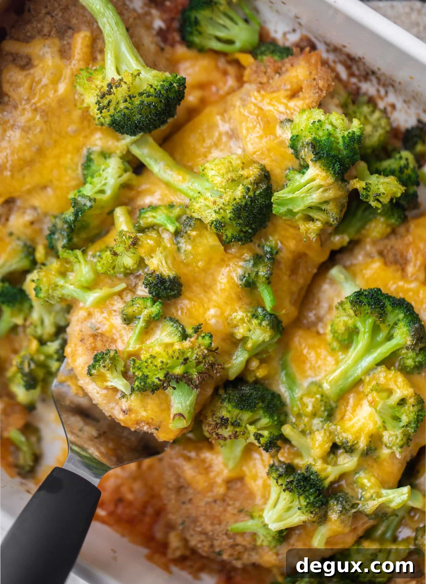 crispy broccoli cheddar melt chicken in a baking dish