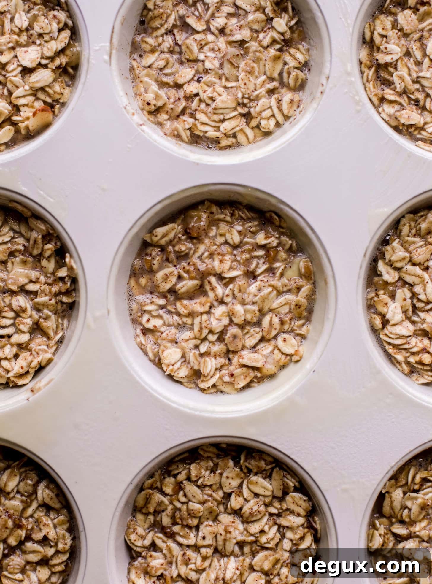 Almond Butter Banana Baked Oatmeal Cups Recipe 4 baked oatmeal cups ready for the oven