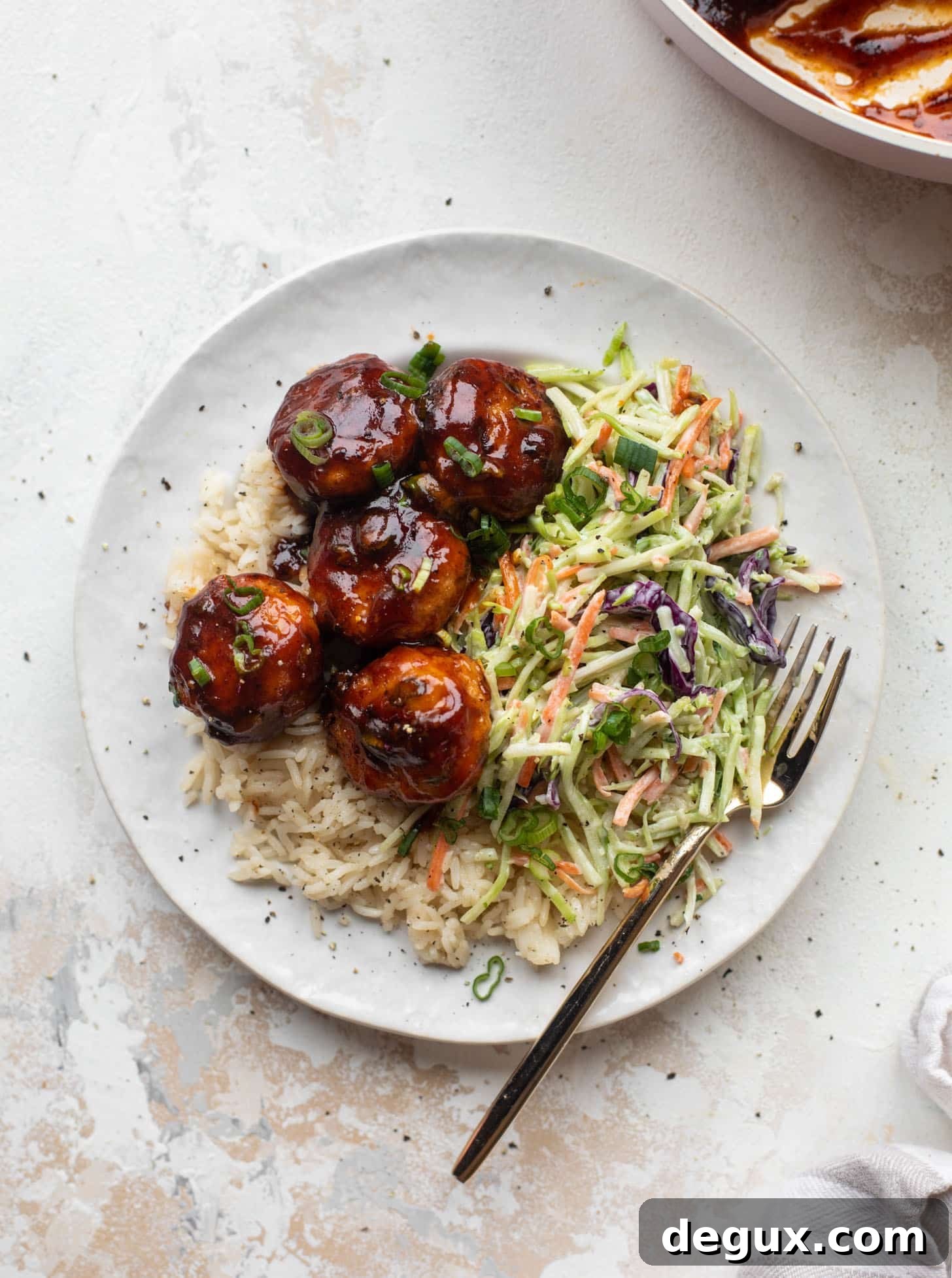 sticky BBQ chicken meatballs with broccoli slaw