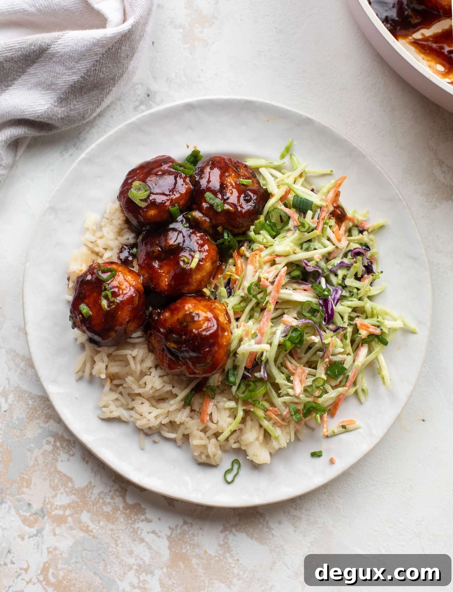 sticky BBQ chicken meatballs with broccoli slaw