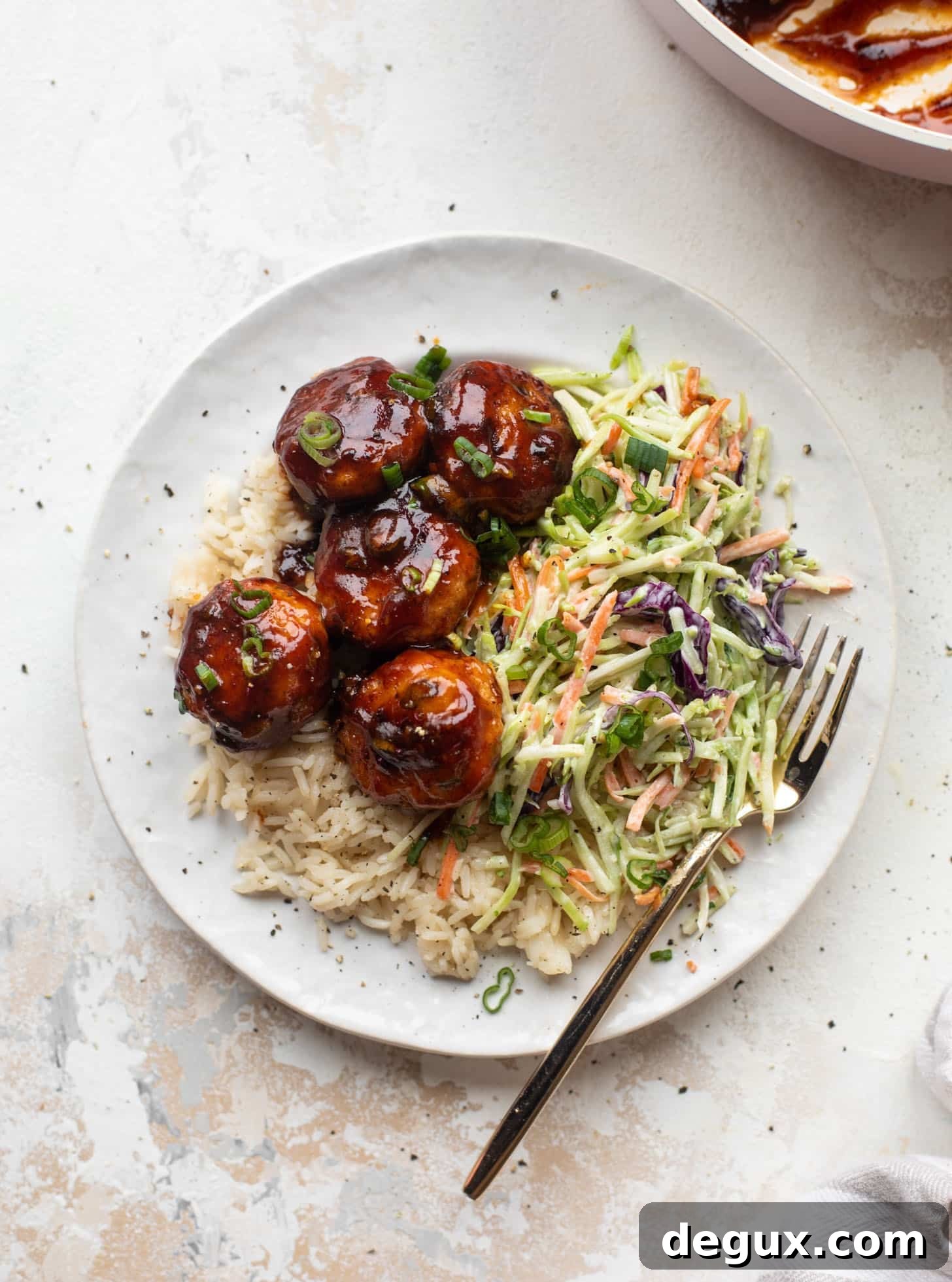 sticky BBQ chicken meatballs with broccoli slaw