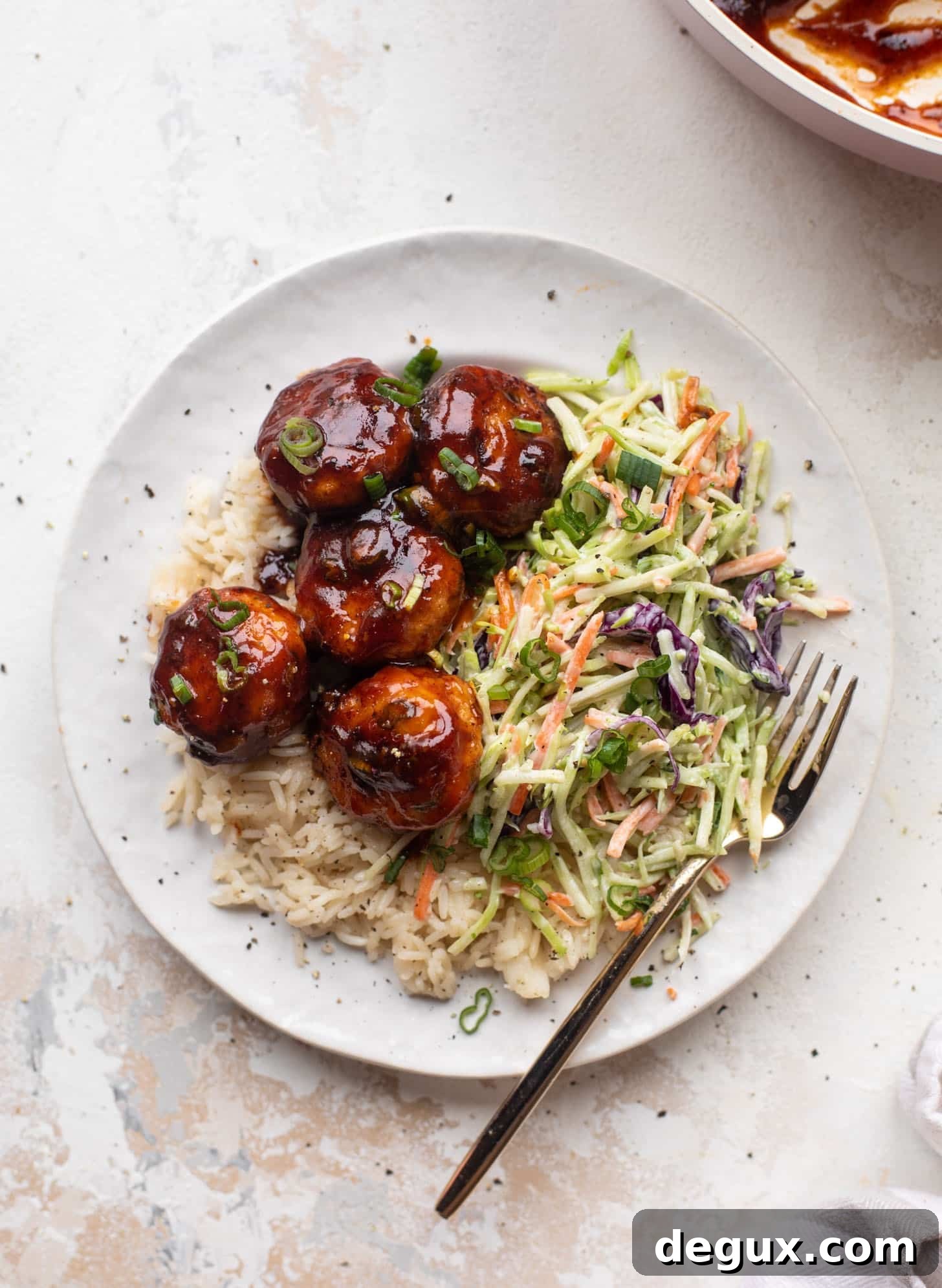 sticky BBQ chicken meatballs with broccoli slaw
