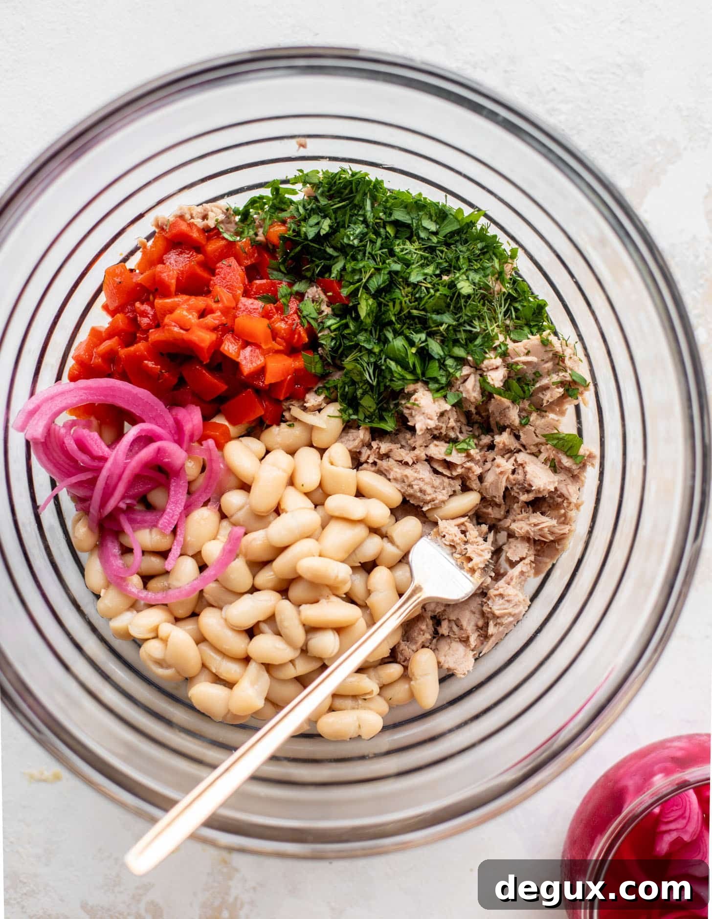 white beans, pickled onions, herbs, roasted red peppers, tuna