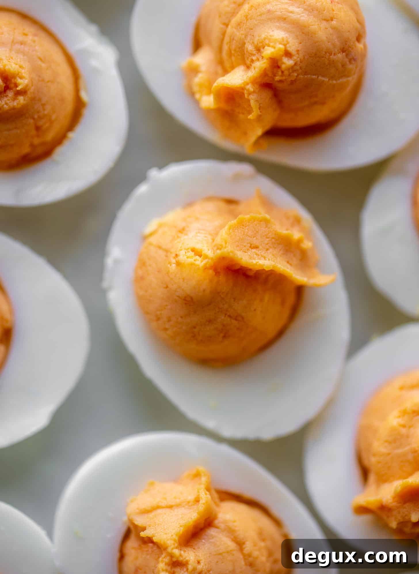 Pimento Cheese Deviled Eggs Topped with Crushed Potato Chips 4 filled deviled eggs