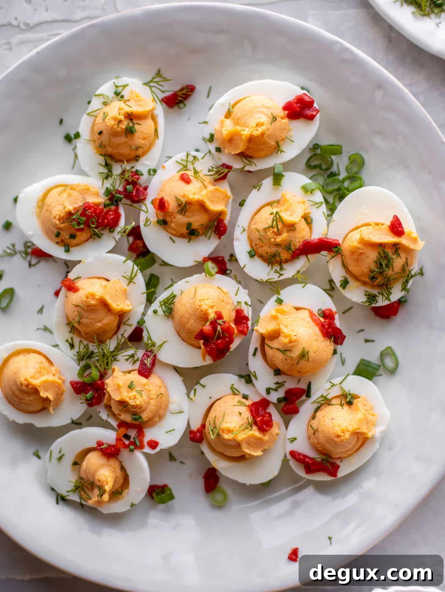 Pimento Cheese Deviled Eggs Topped with Crushed Potato Chips 5 pimento cheese deviled eggs