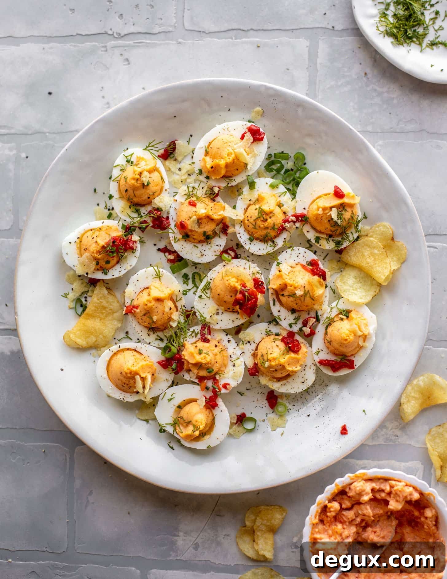 Pimento Cheese Deviled Eggs Topped with Crushed Potato Chips 9 pimento cheese deviled eggs