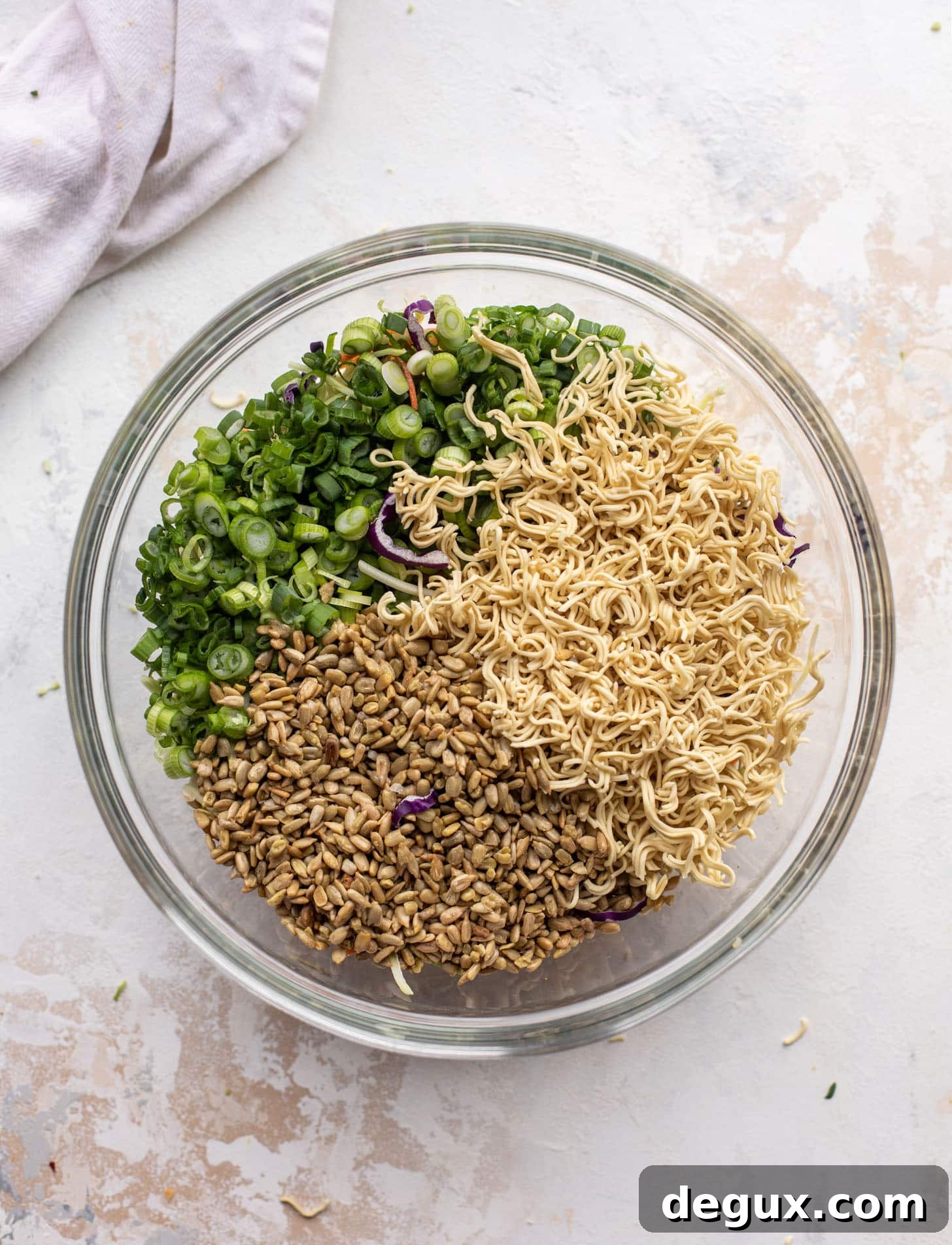 Crispy Broccoli Slaw That Goes With Any Meal 5 ramen noodles, green onions, sunflower seeds