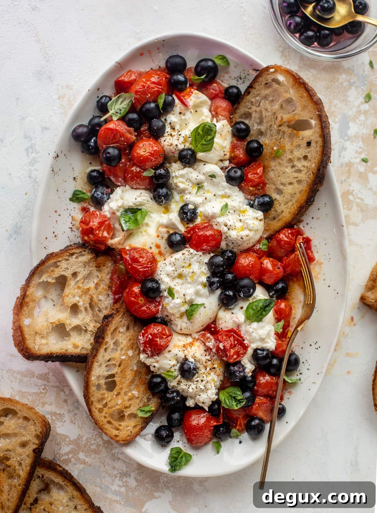 red white and pickled blueberry burrata platter