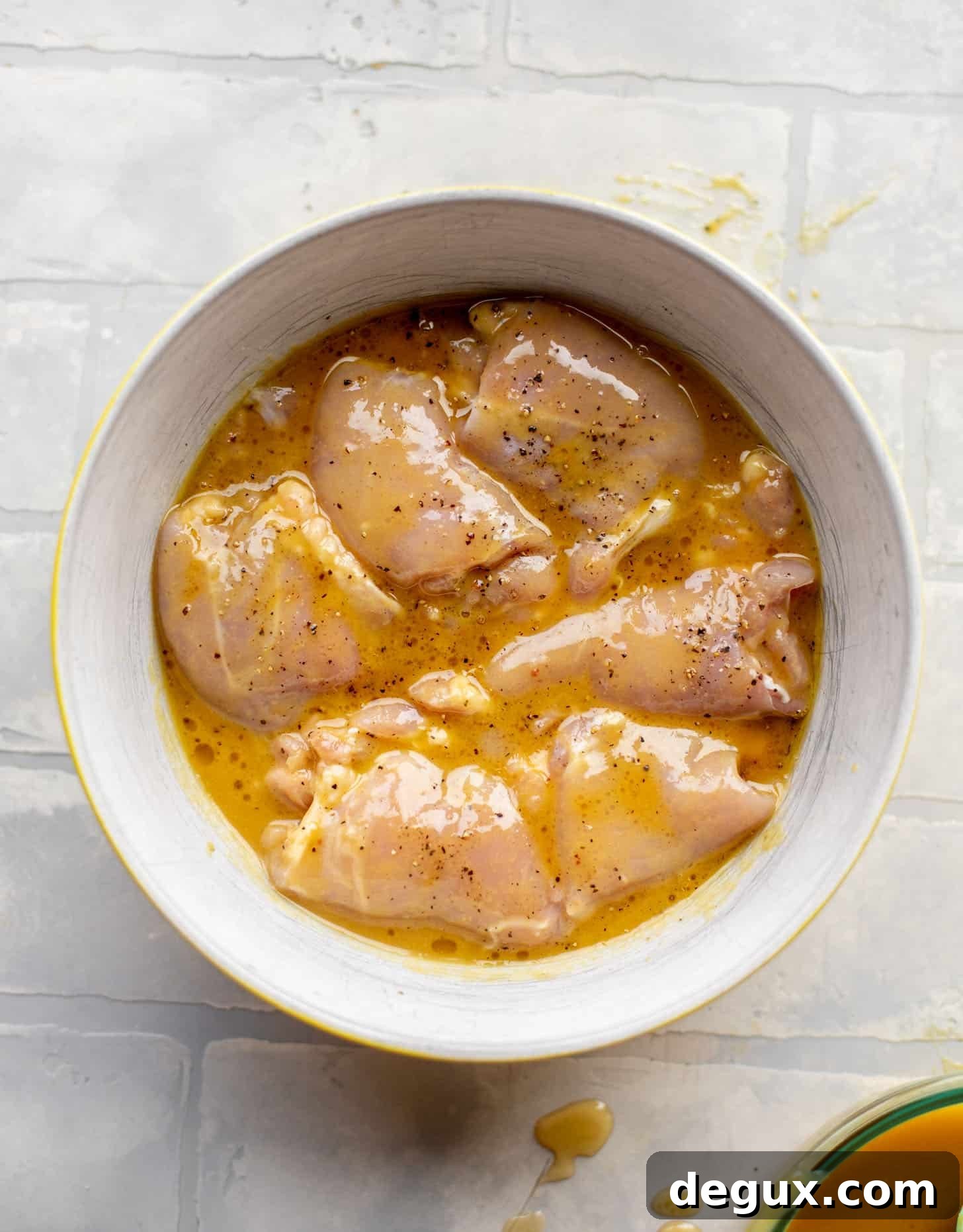 chicken marinating in honey mustard