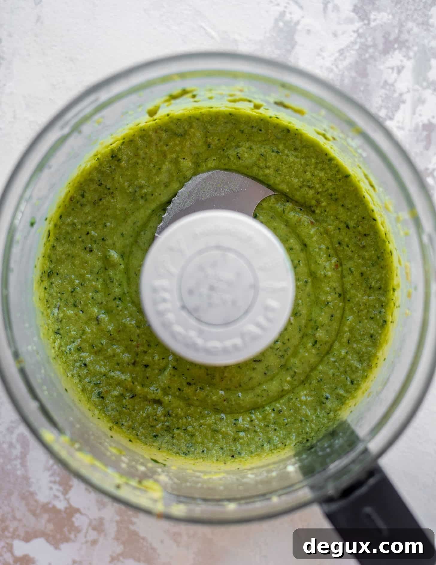 Creamy Avocado Pesto Pasta Recipe for Quick Weeknight Meals 4 avocado pesto in a food processor