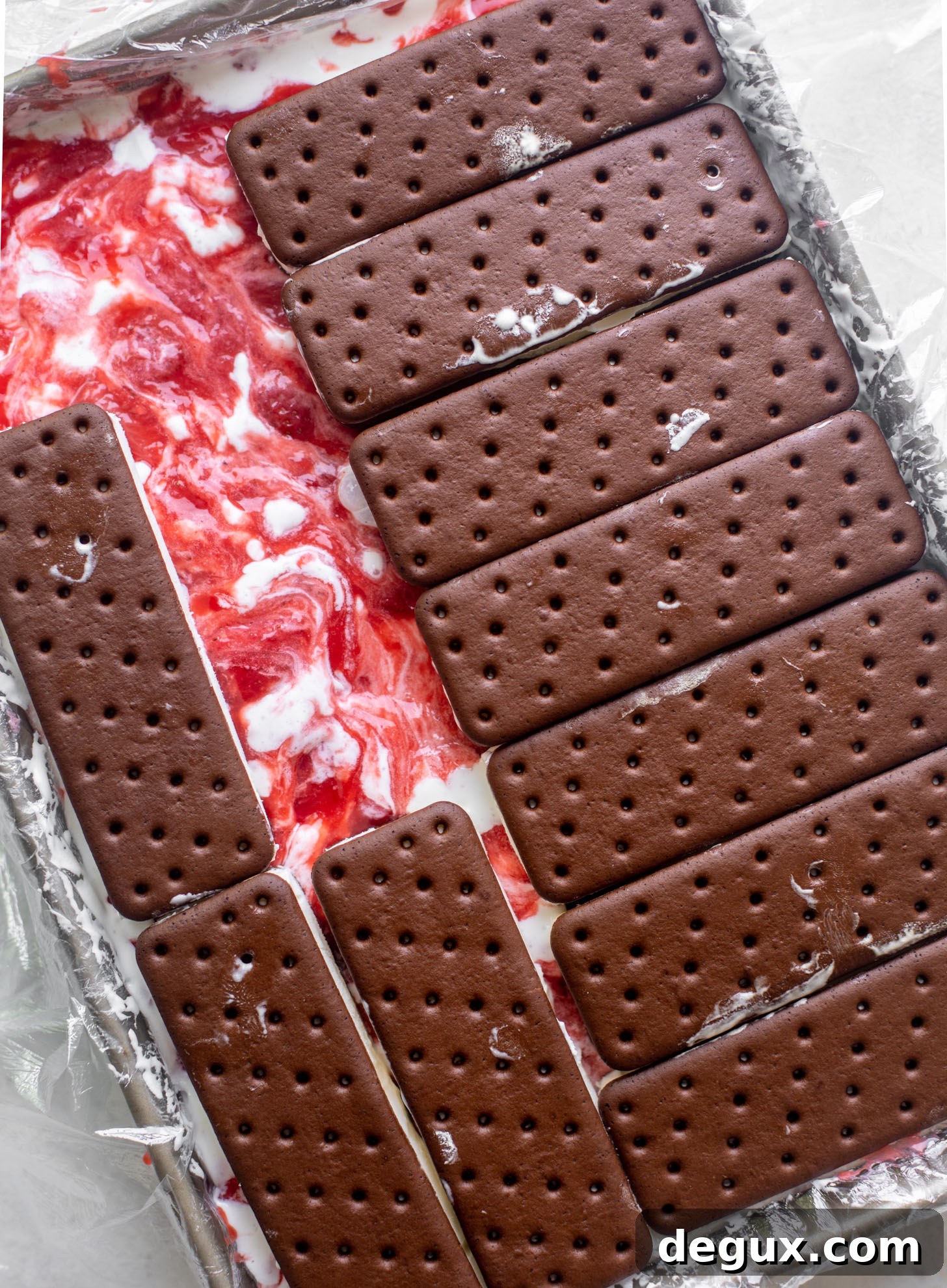 Triple Berry Ice Cream Cake Recipe for Summer Parties 3 ice cream sandwiches on cake