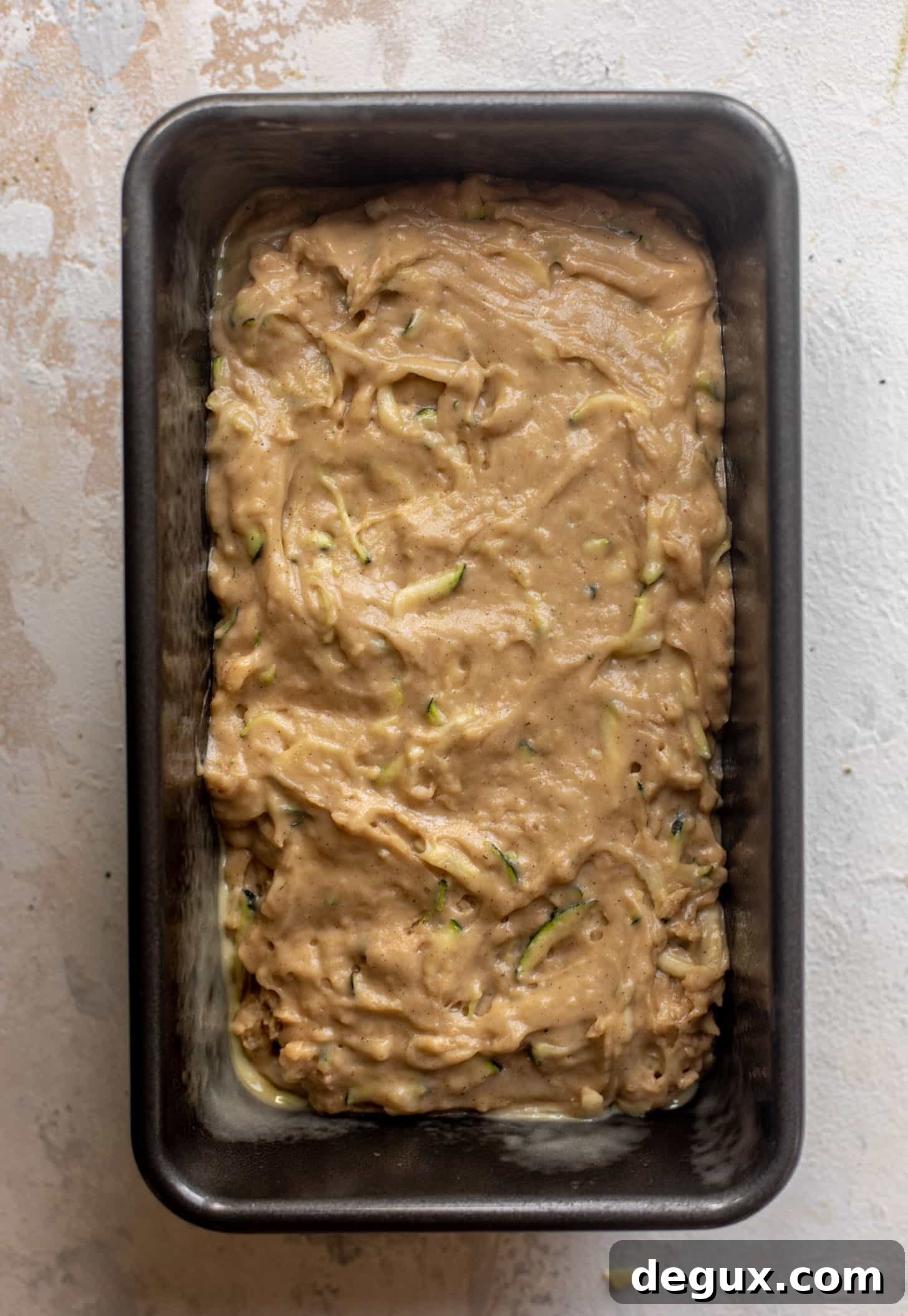 Chocolate Chip Crust Zucchini Bread Recipe 4 batter in a loaf pan