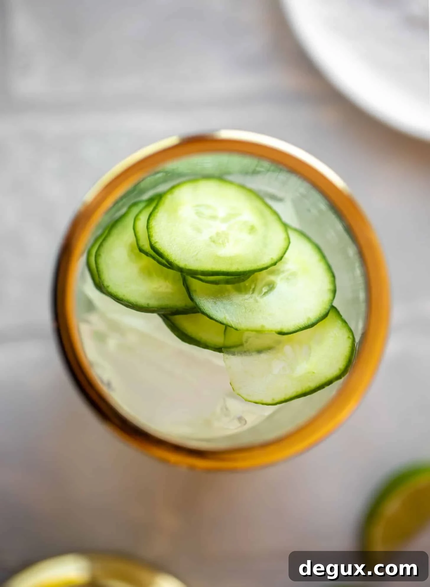 Cucumber Mint Margarita Recipe: Refreshing Summer Cocktail Guide 3 cocktail shaker with cucumbers
