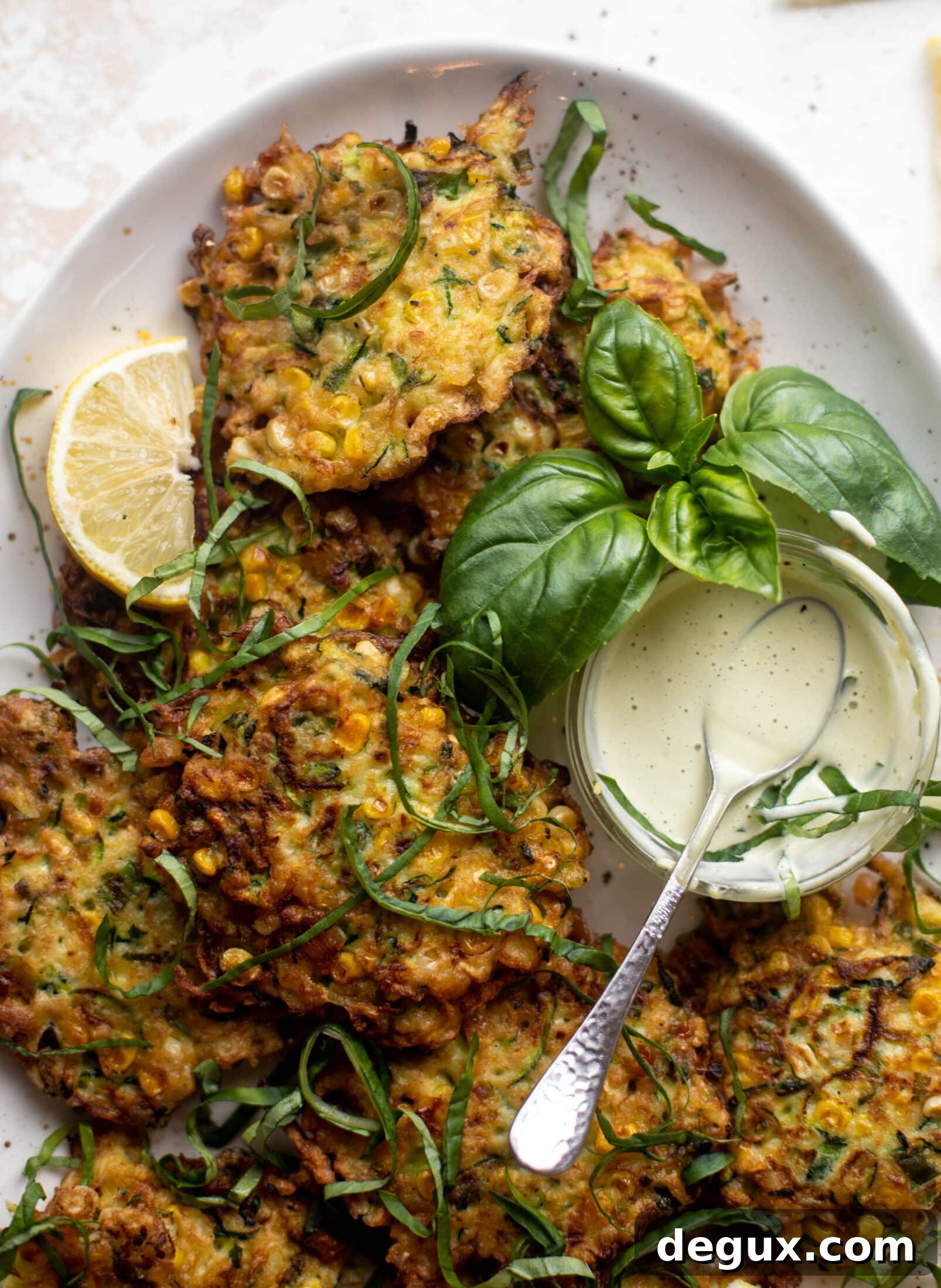 Zucchini and Corn Fritters with Lemon Basil Aioli Recipe 2 zucchini corn fritters with lemon basil aioli