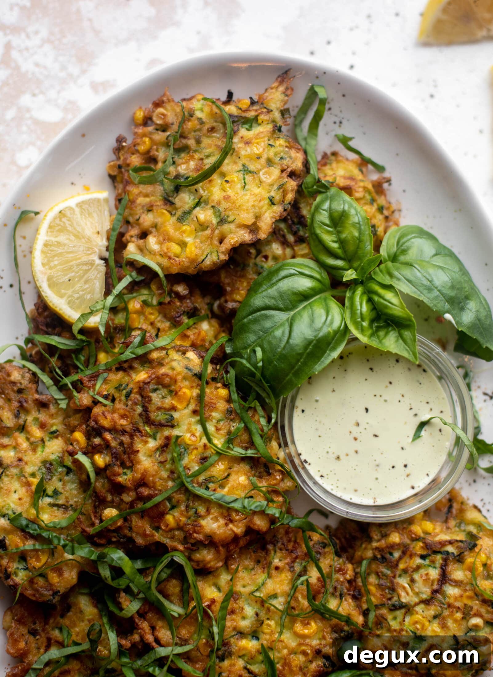 Zucchini and Corn Fritters with Lemon Basil Aioli Recipe 13 zucchini corn fritters with lemon basil aioli