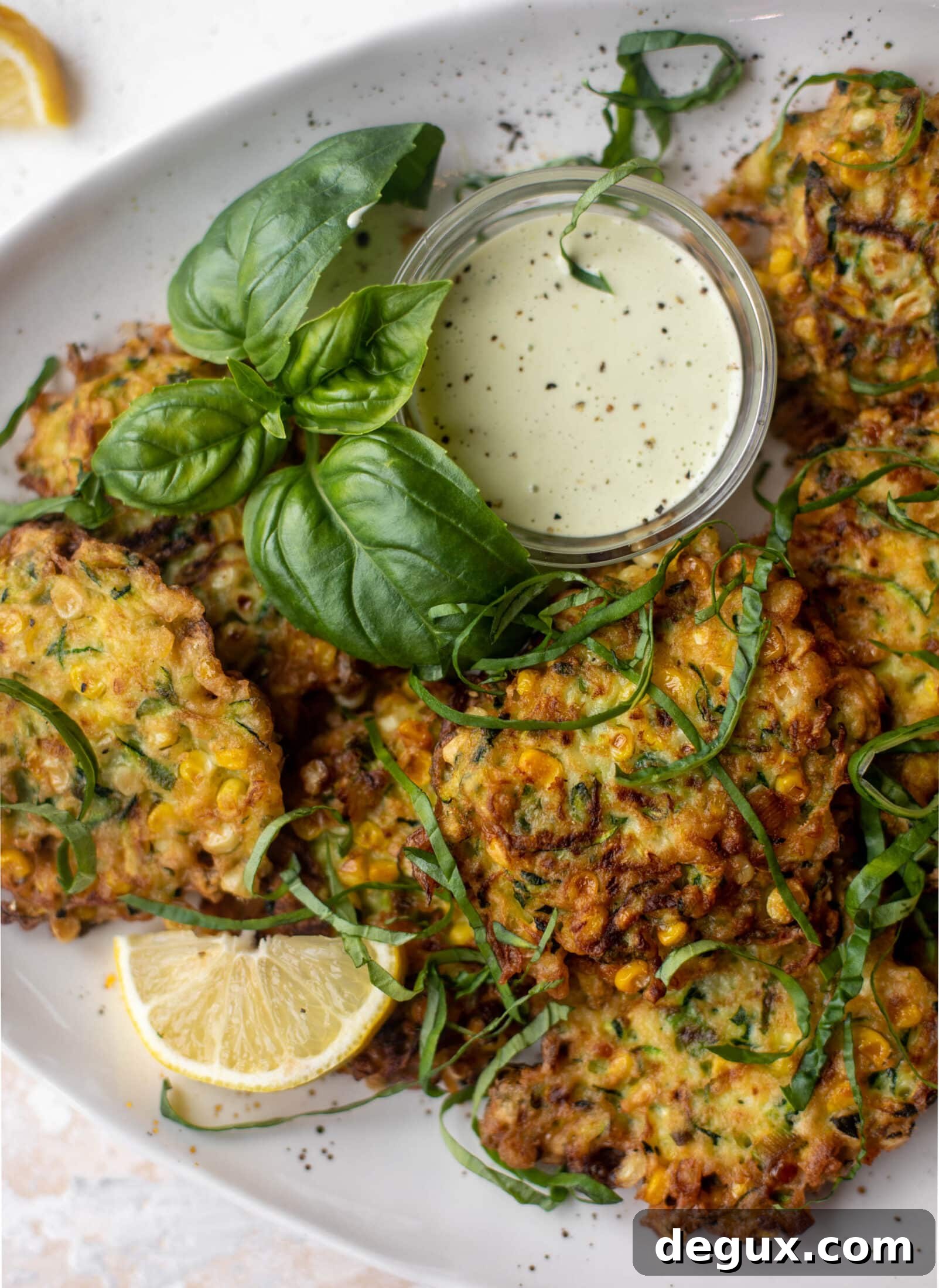 Zucchini and Corn Fritters with Lemon Basil Aioli Recipe 10 zucchini corn fritters with lemon basil aioli