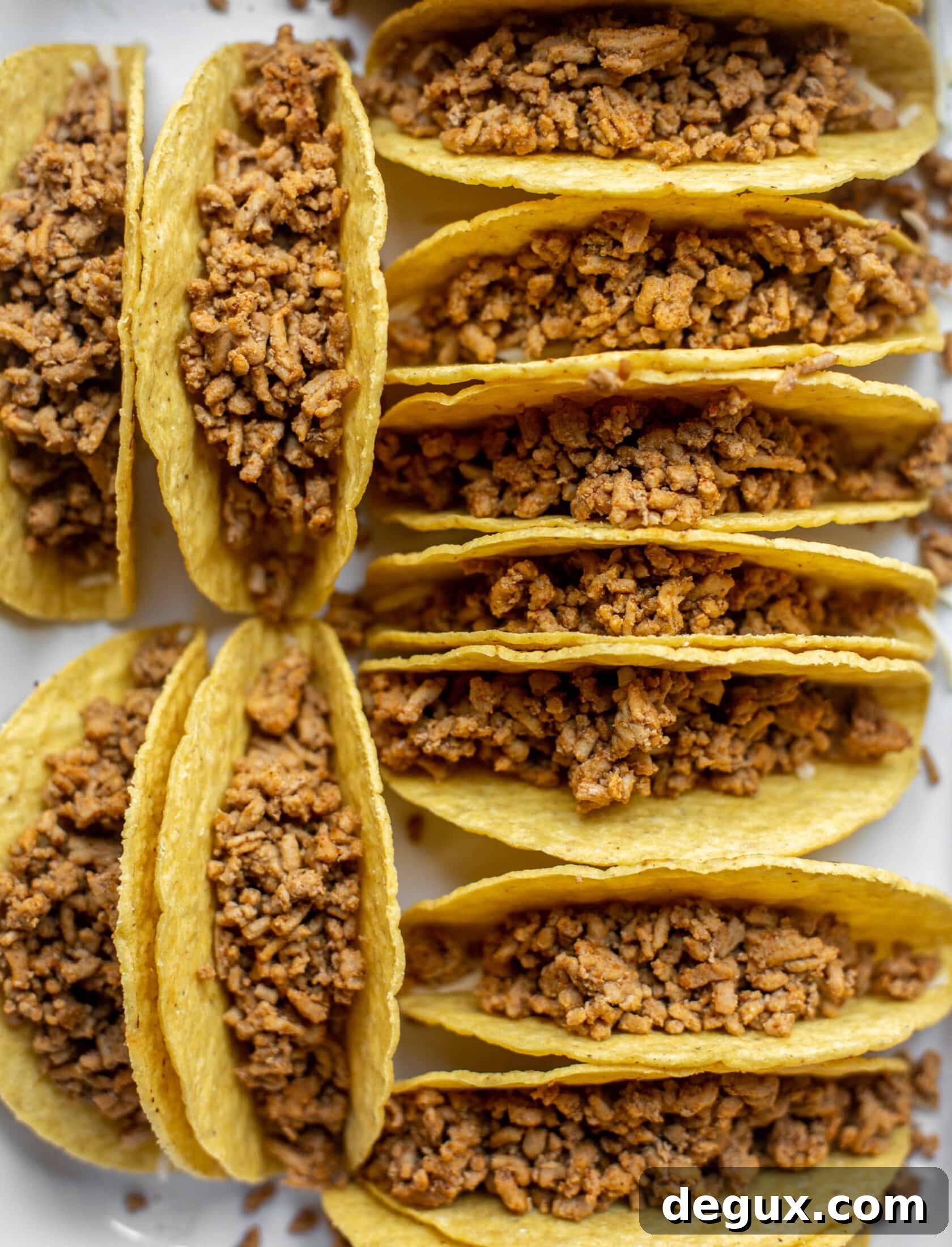 Quick Baked Turkey Tacos for Busy Weeknights 3 taco shells stuffed with ground turkey