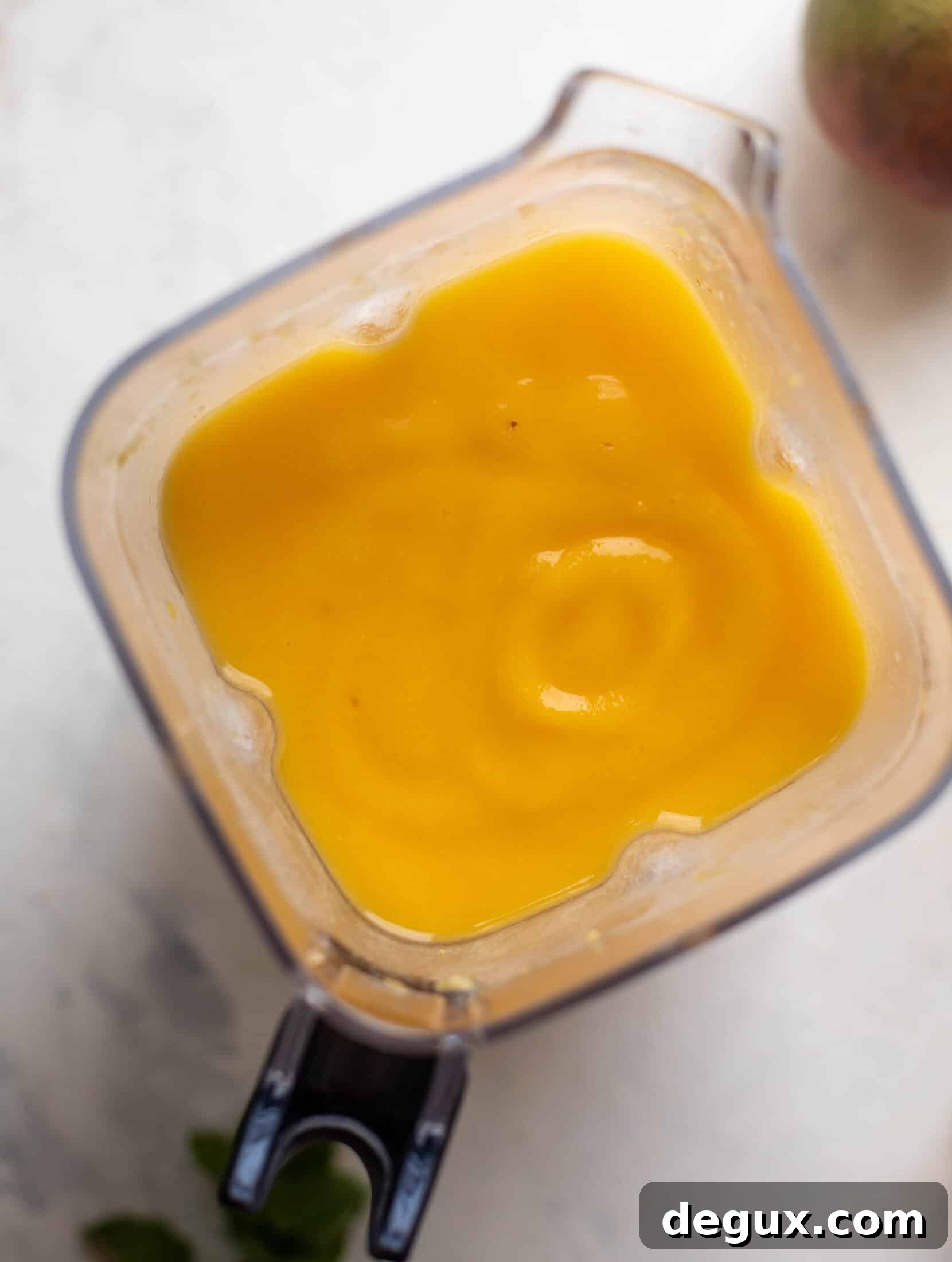 Mango Frosé: Refreshing Frozen Rosé Cocktail Recipe 4 Frozen mango pieces