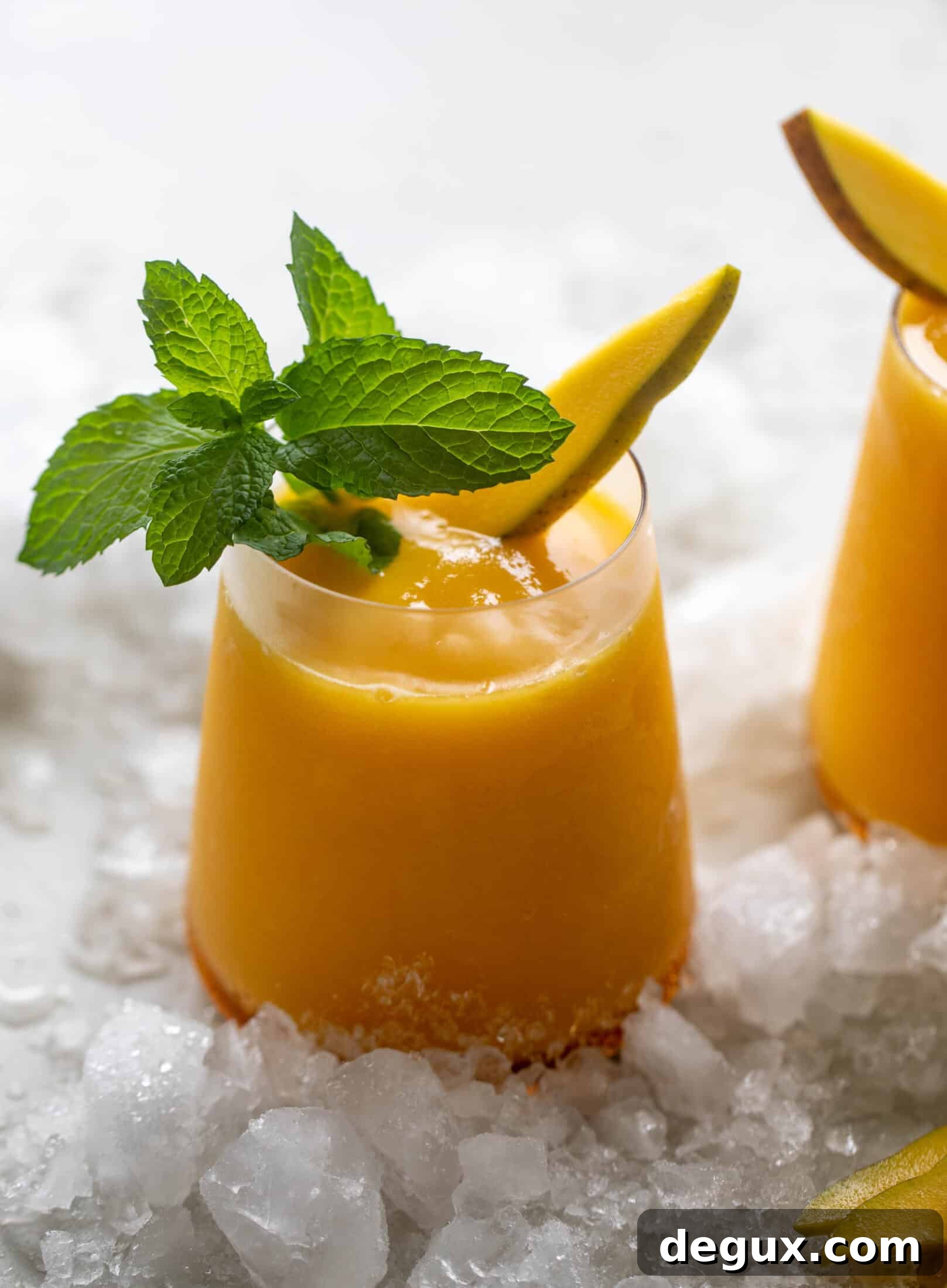 Mango Frosé: Refreshing Frozen Rosé Cocktail Recipe 9 Mango frosé served in a glass