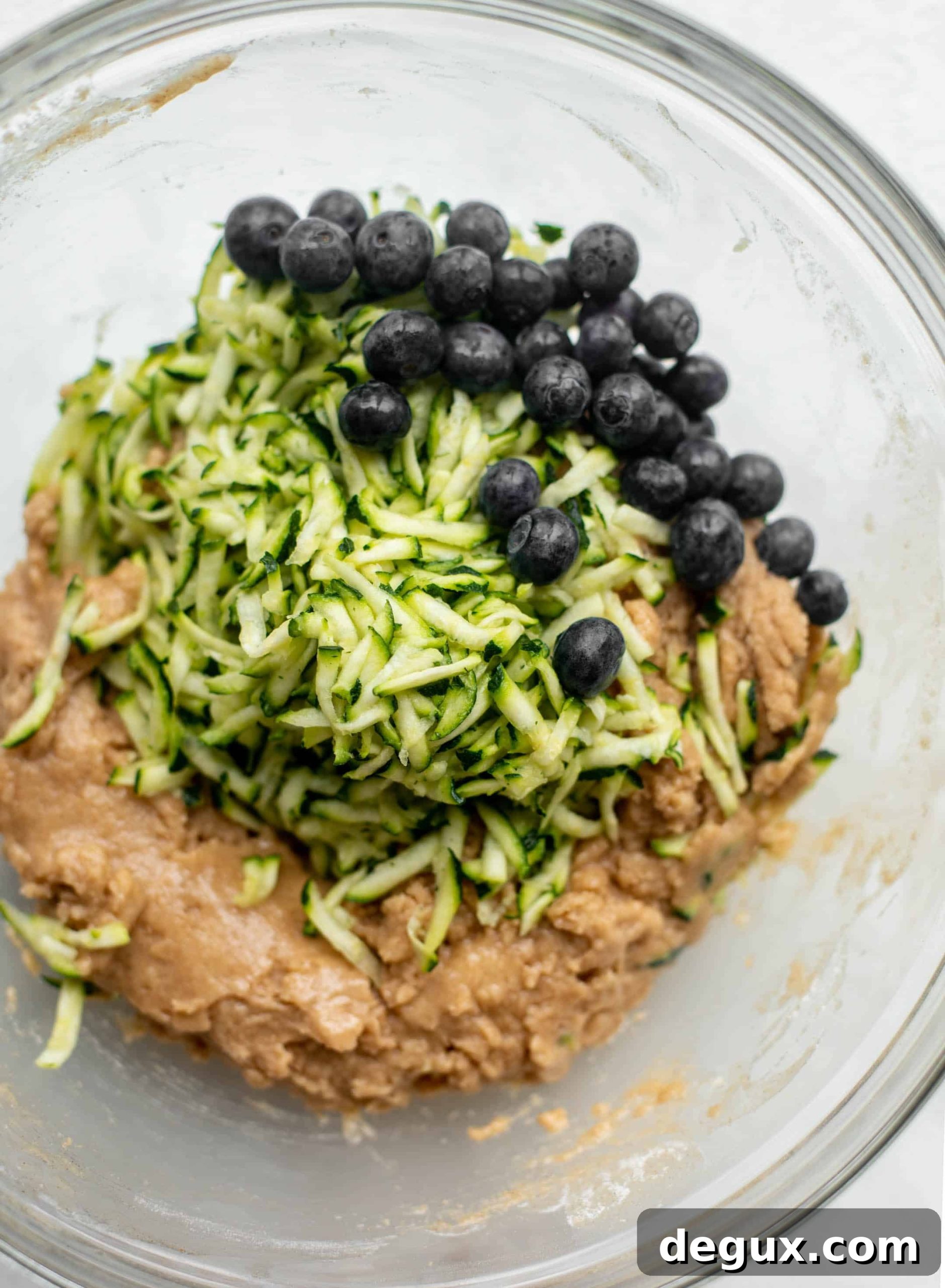blueberry zucchini muffin batter