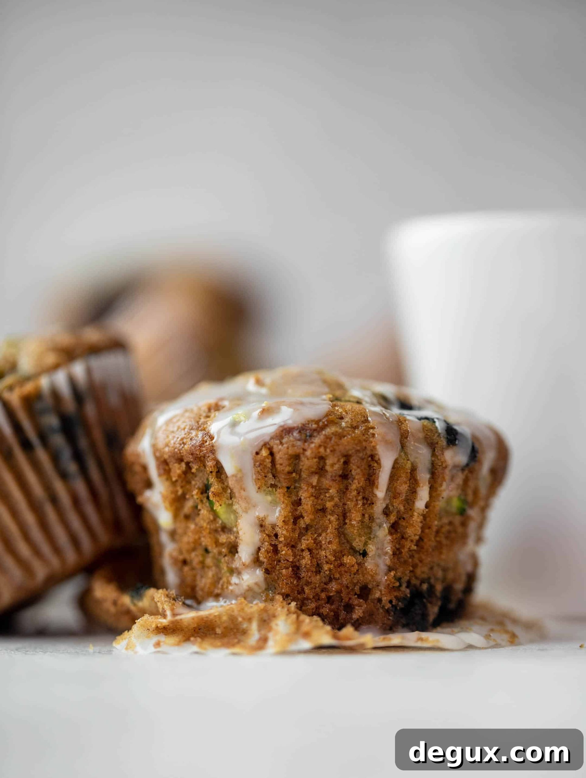 blueberry zucchini muffins with lemon glaze