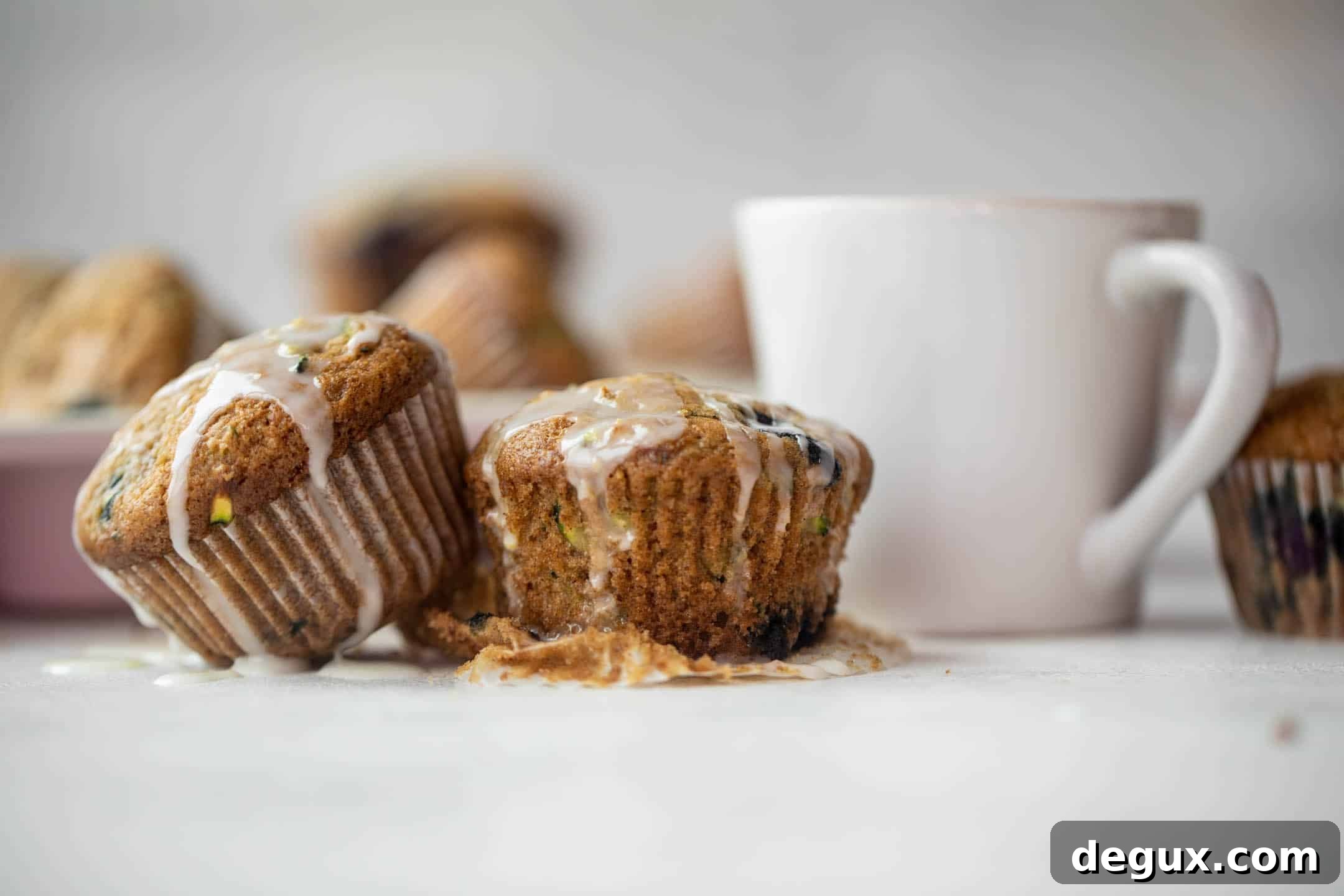 blueberry zucchini muffins with lemon glaze