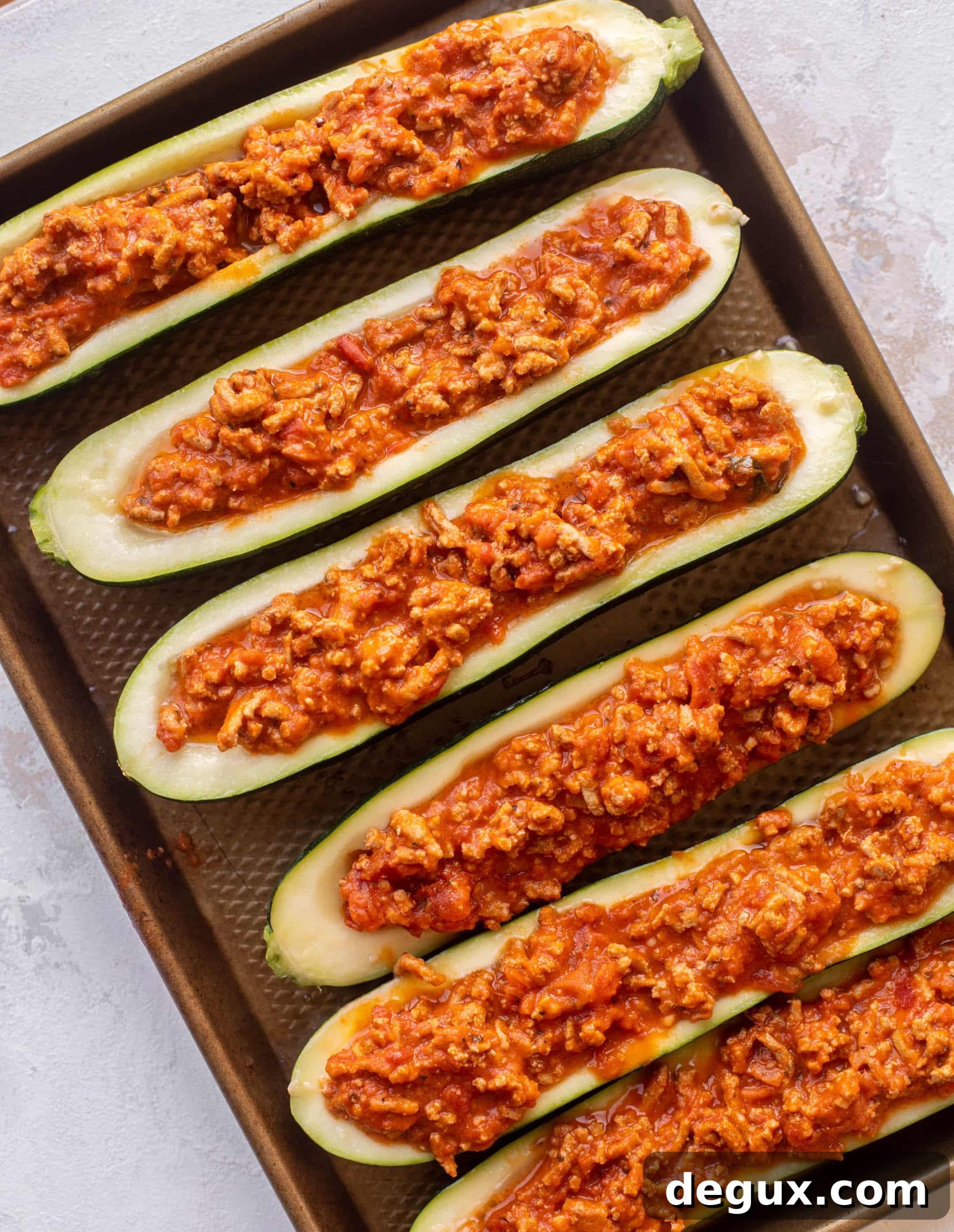 zucchini boats filled with meat sauce