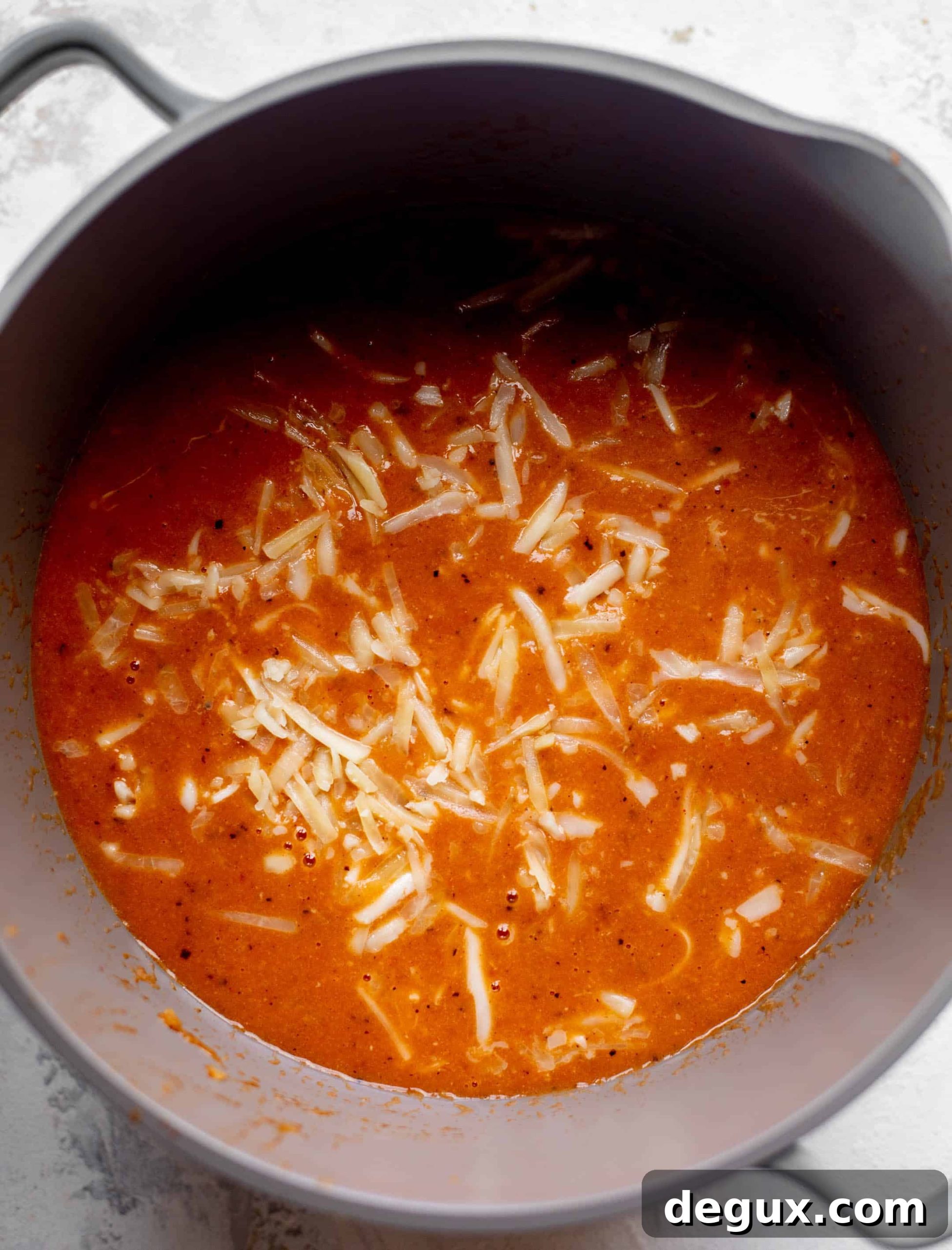tortilla soup base with cheese