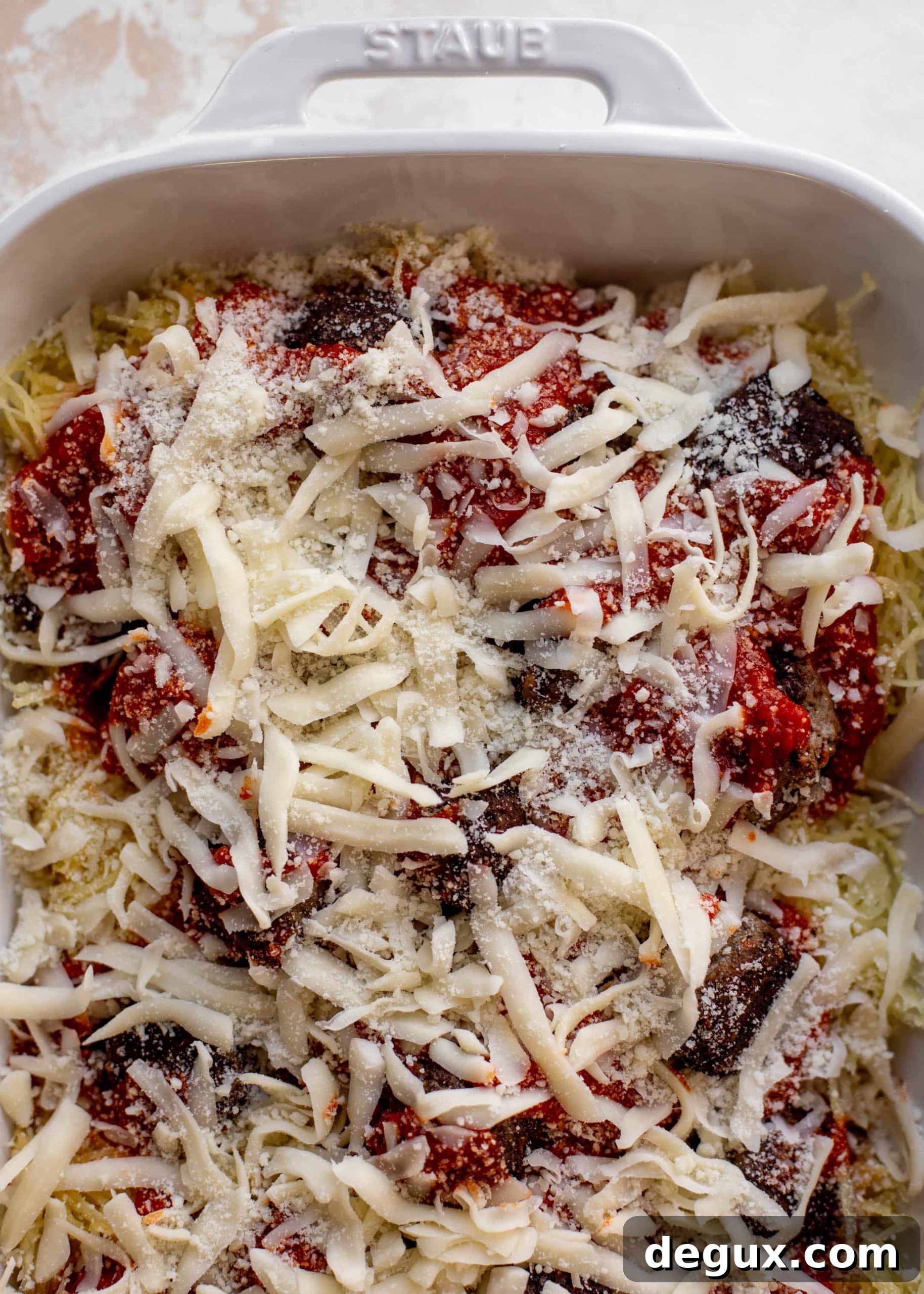 baked spaghetti squash and meatballs ready for the oven