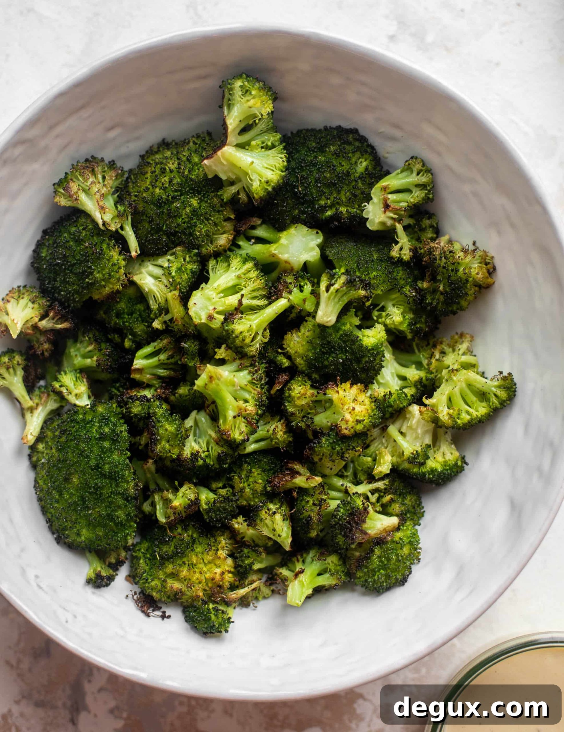 Roasted Broccoli Caesar Salad with Crispy Croutons 5 roasted broccoli in a bowl