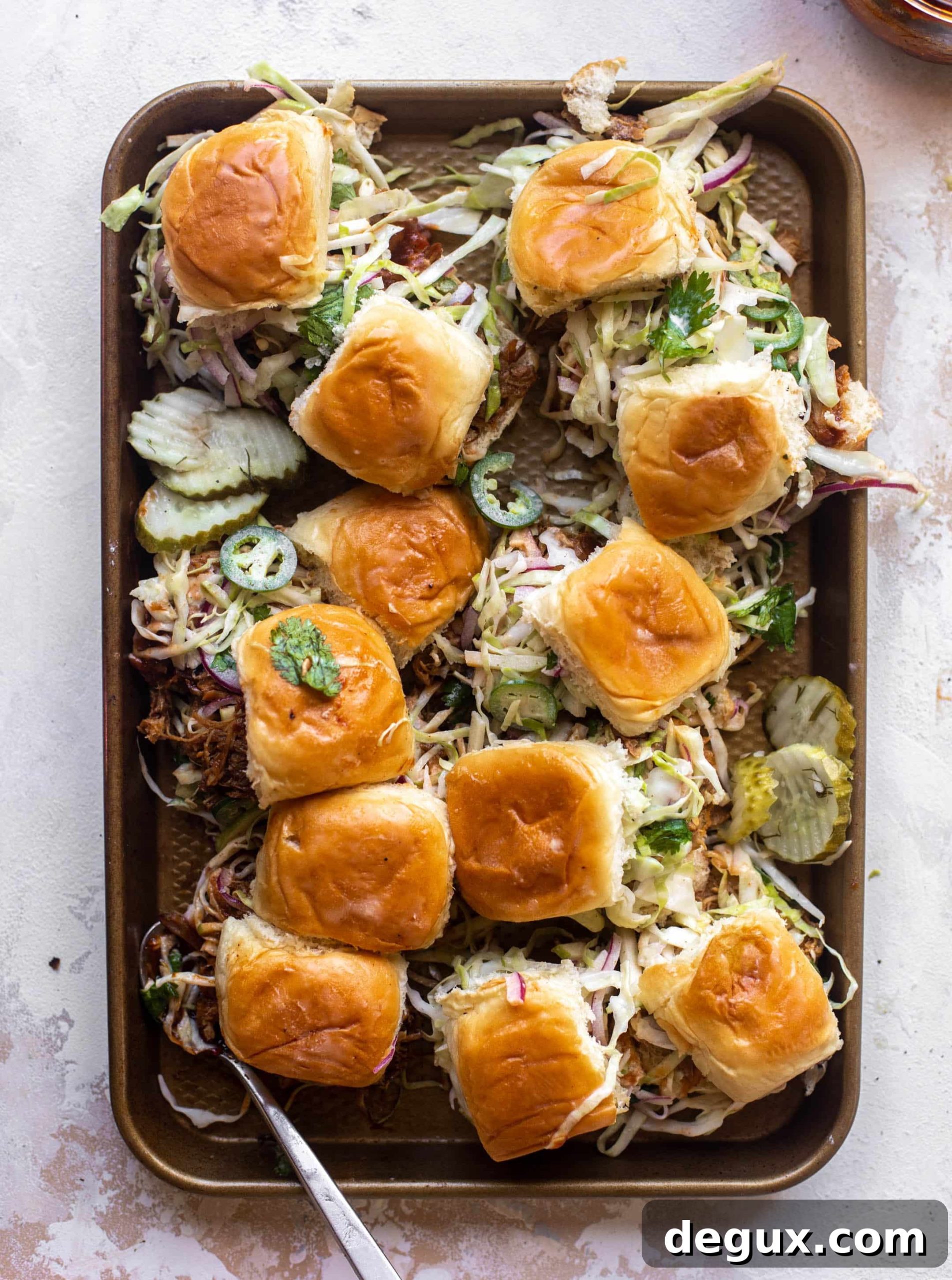 root beer pulled pork sliders with jalapeño slaw