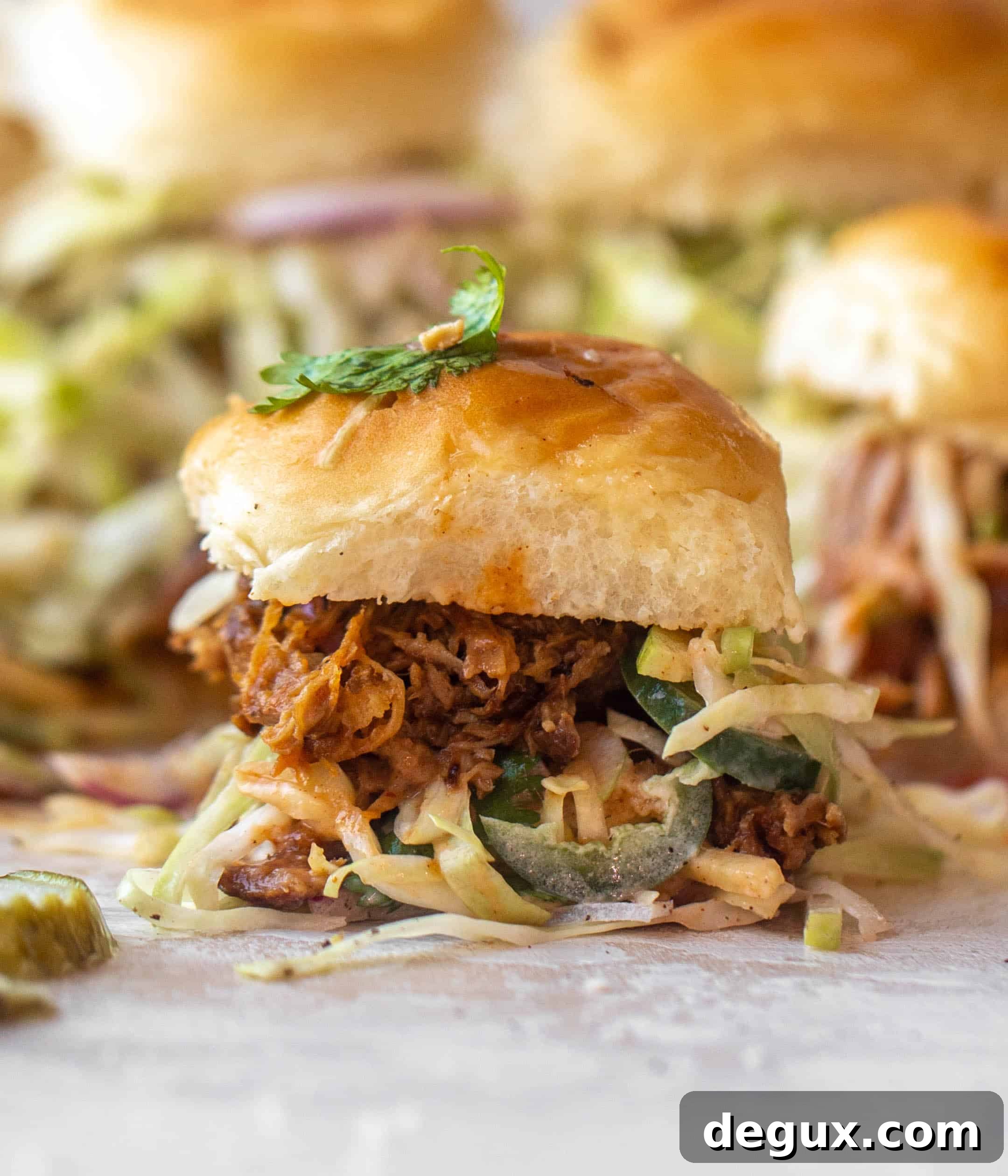 root beer pulled pork sliders with jalapeño slaw