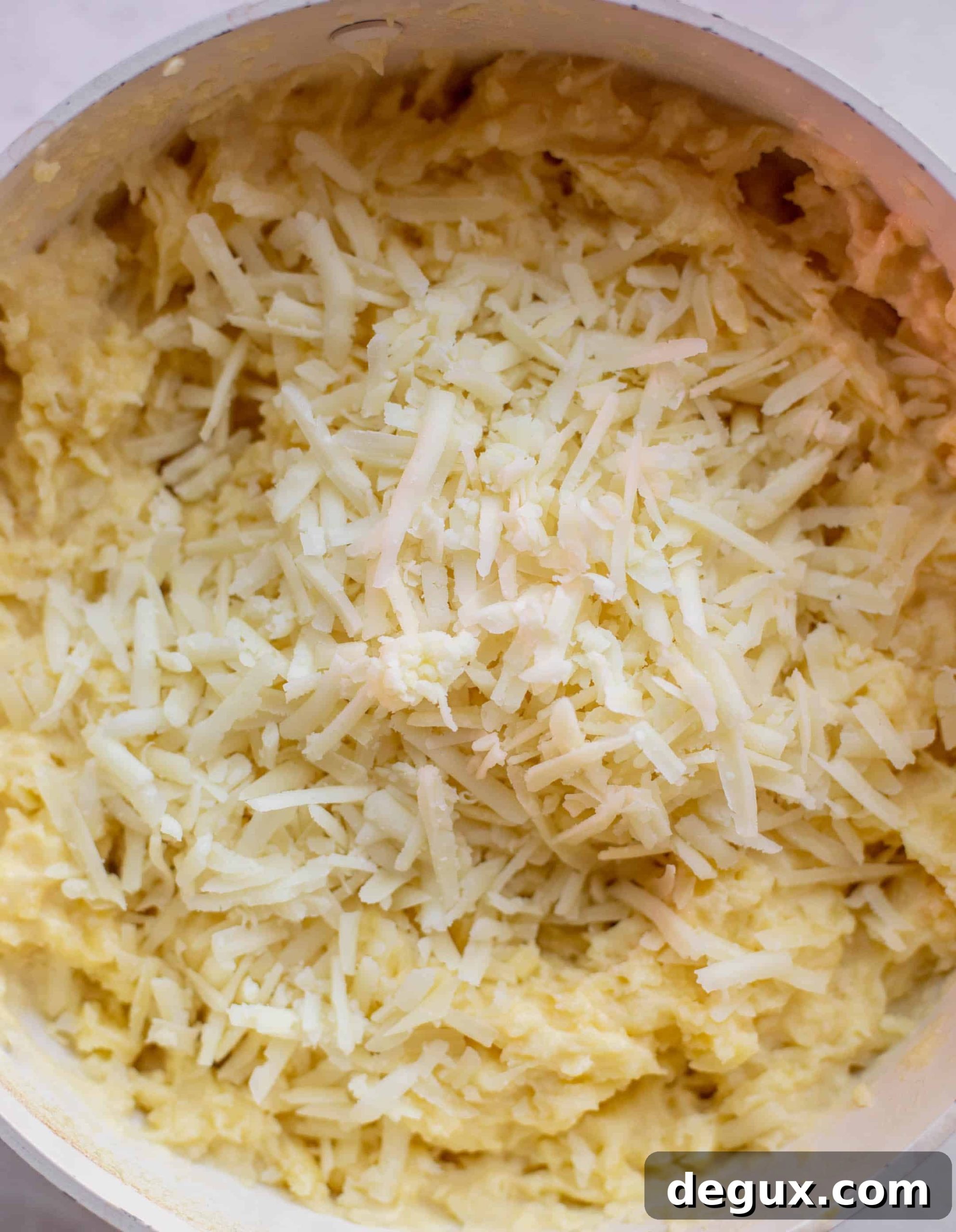 Whipped Potatoes with Manchego Cheese 5 potatoes with shredded manchego