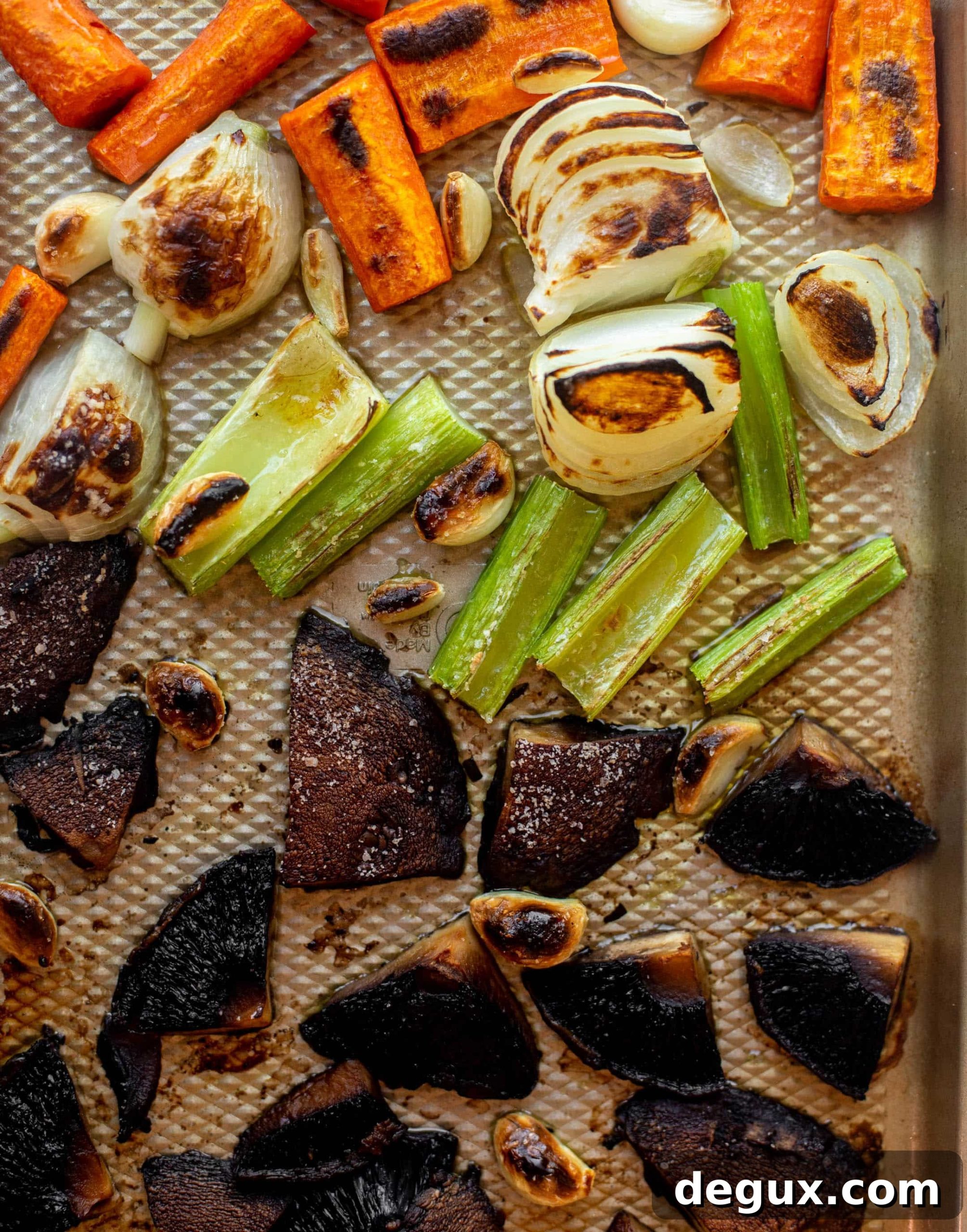 roasted vegetables on a sheet pan