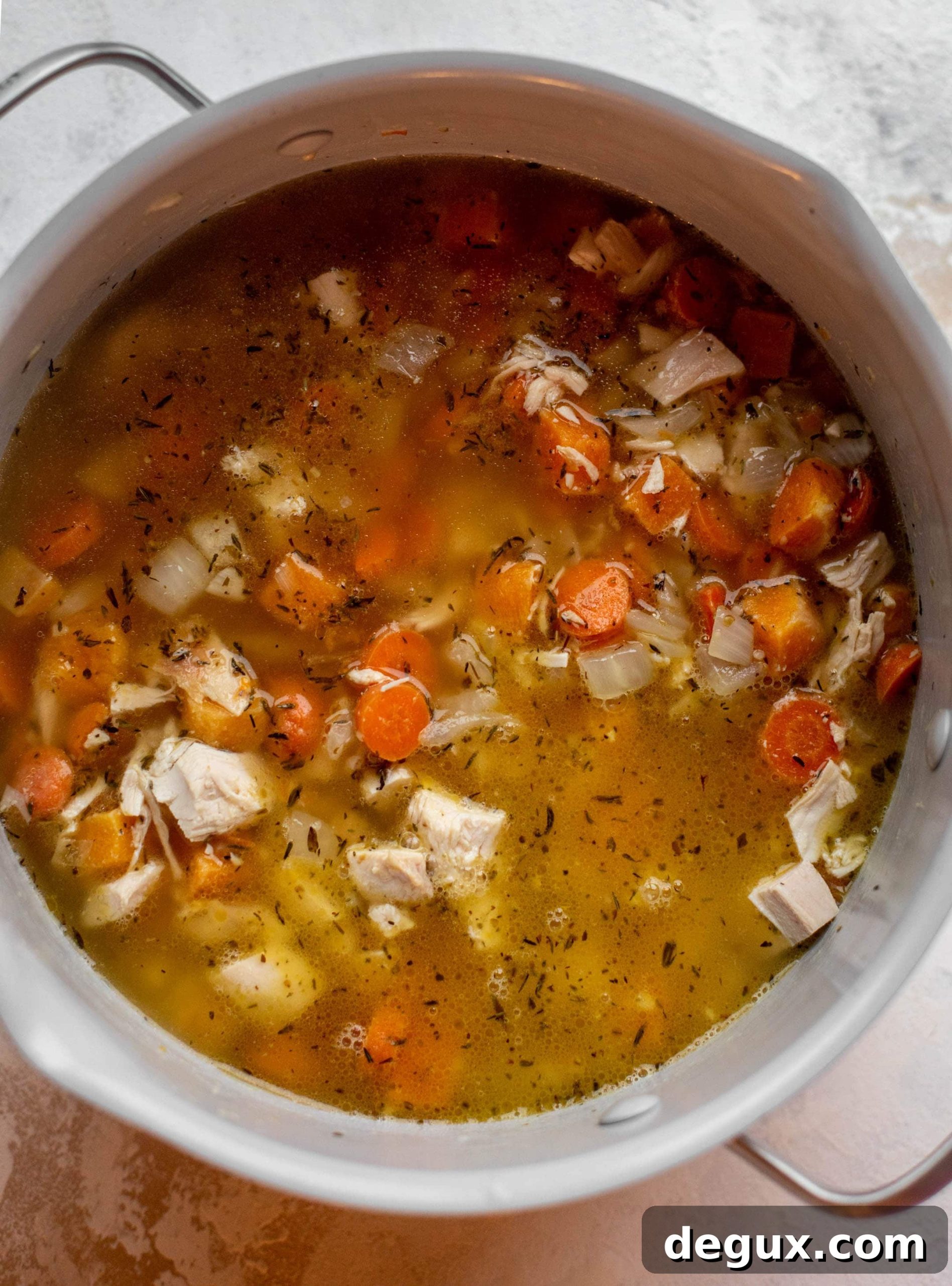 chicken soup in a pot