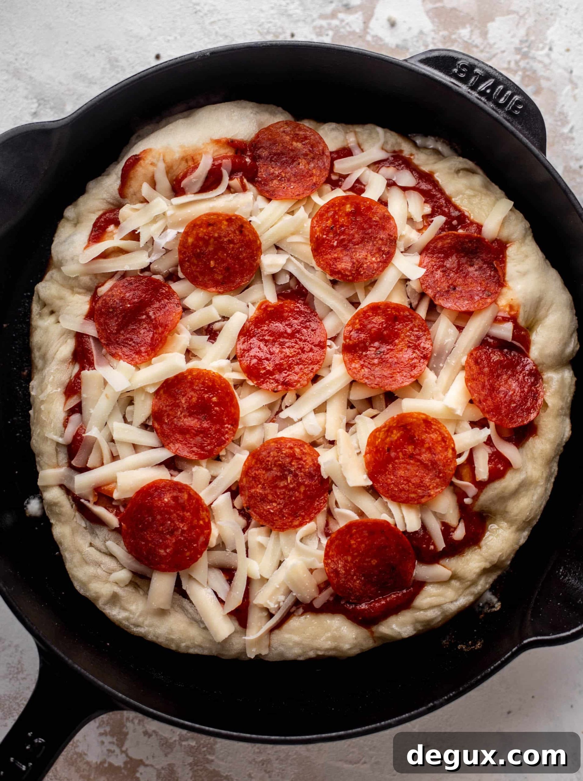 Skillet Pepperoni Pizza with Hot Honey and Blue Cheese Crumbles 3 cast iron skillet pepperoni pizza